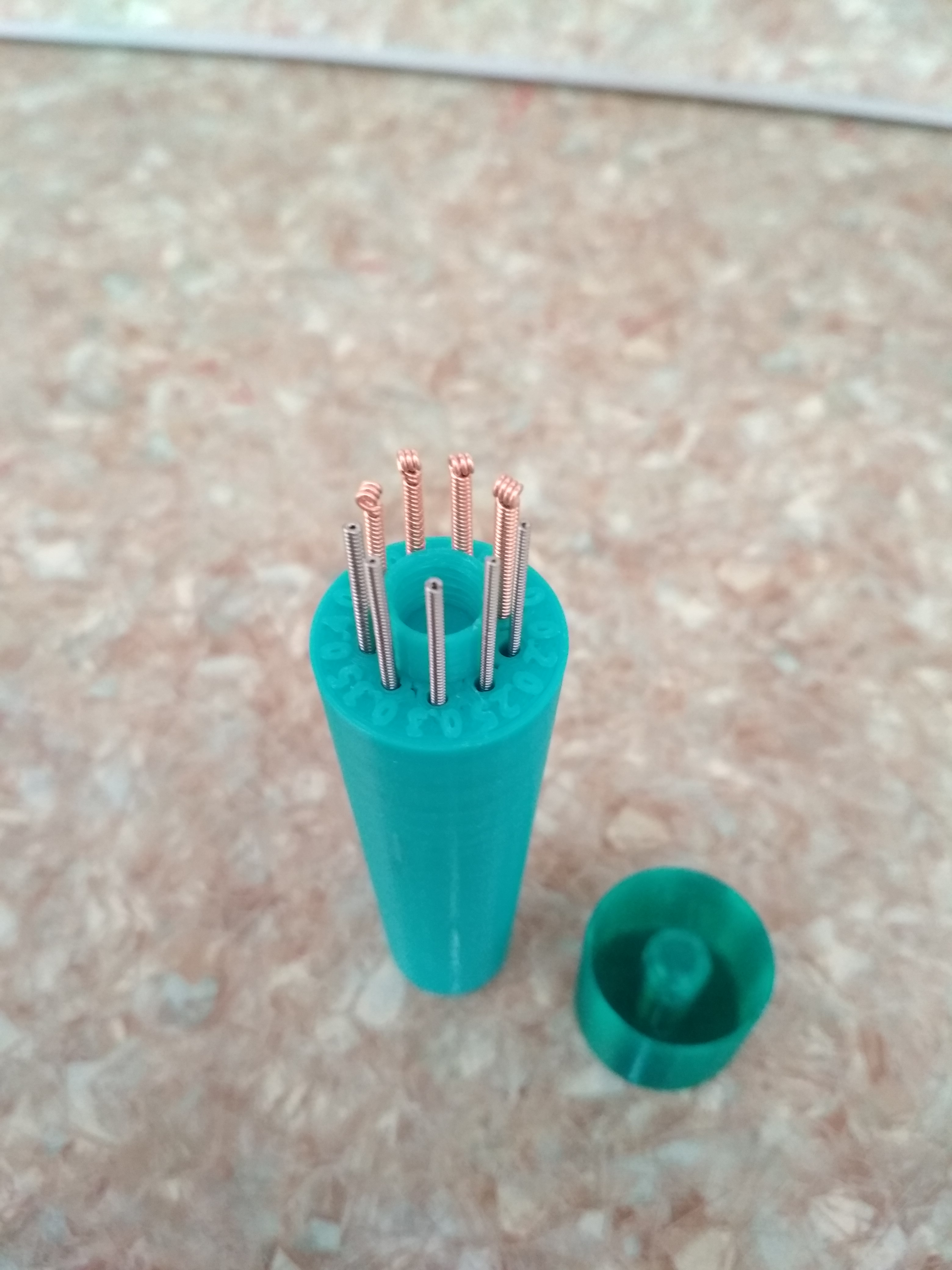Nozzle cleaning needle case