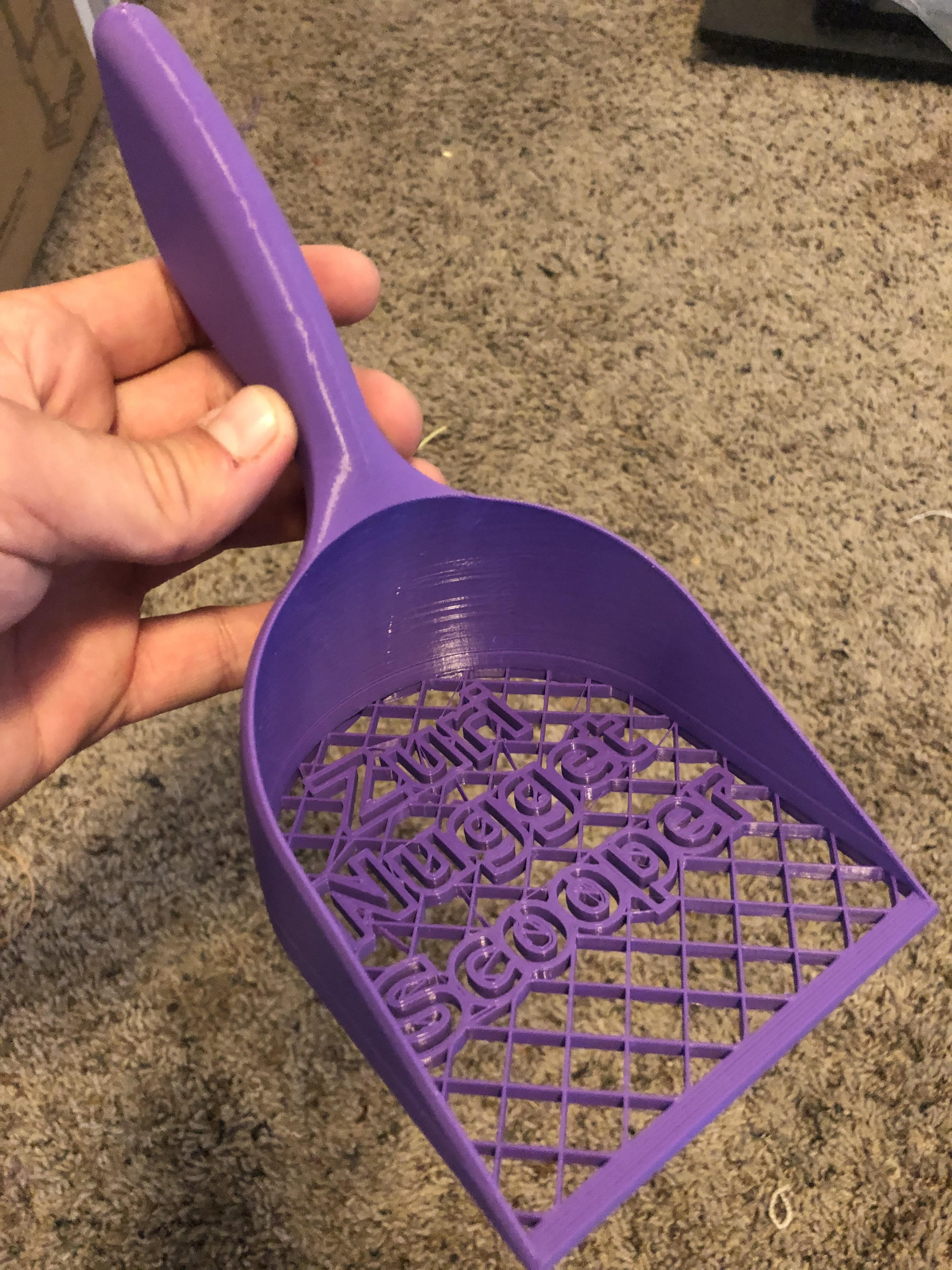 "Sifting Shovel" with sieve filter. AKA "Pooper Scooper"