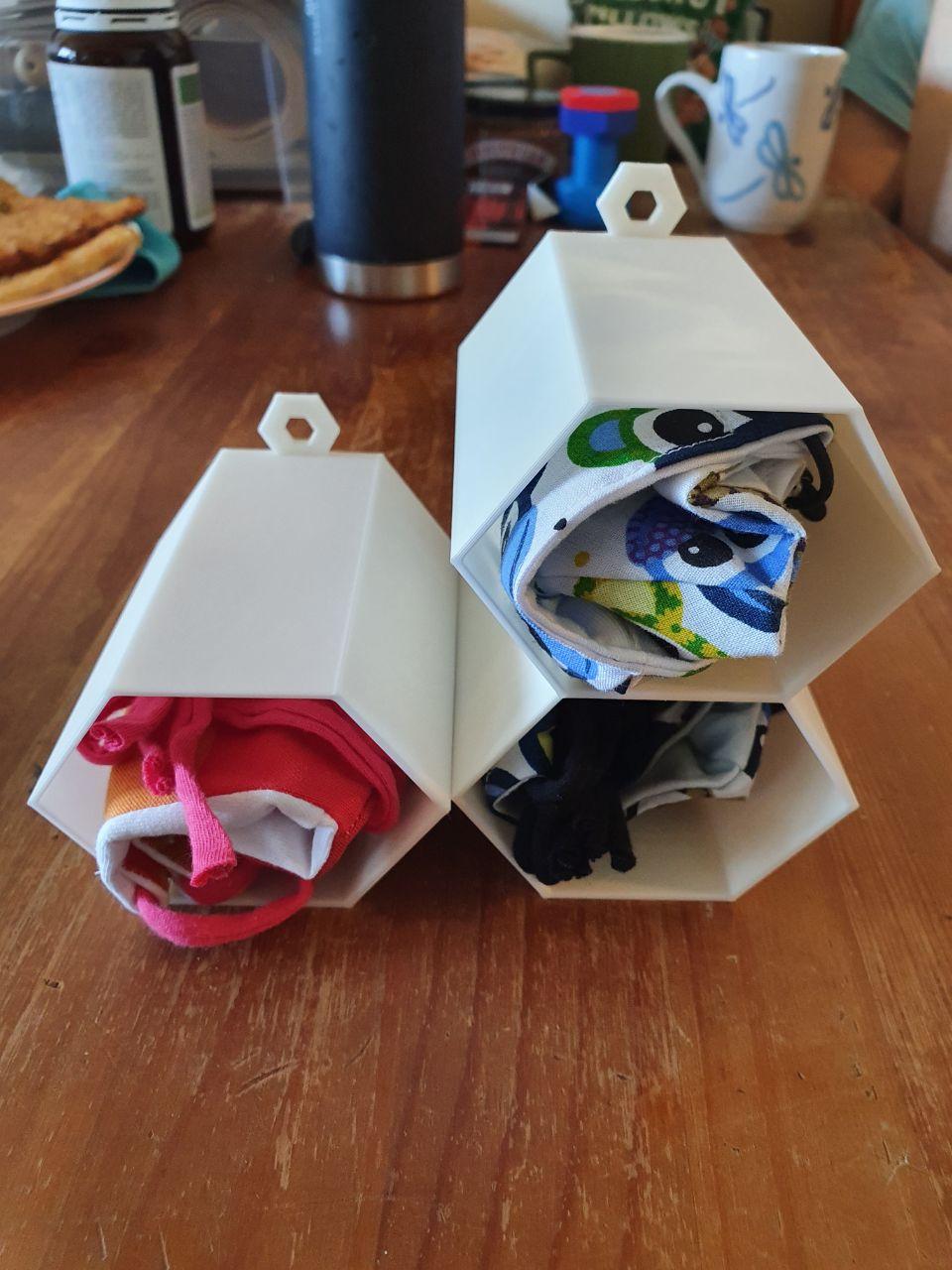 a textile mask storage for each family member