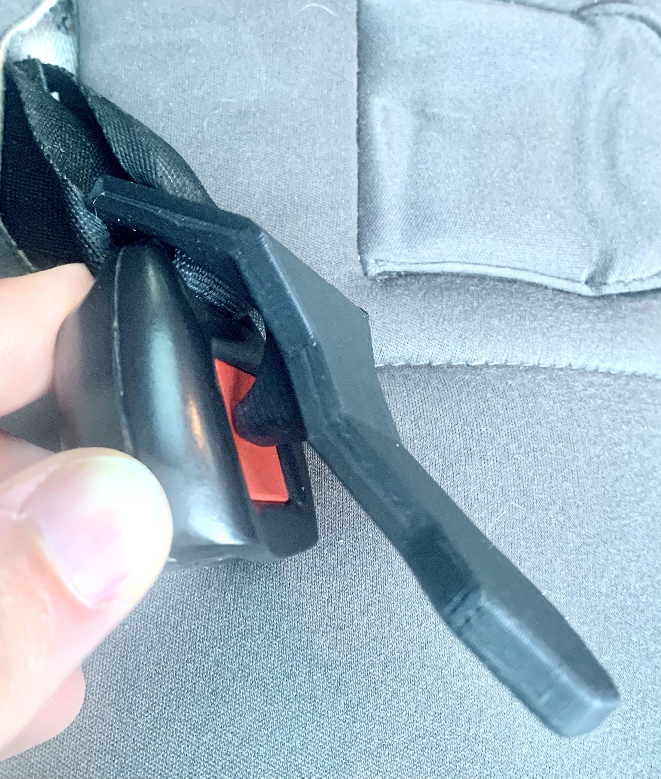 Child carseat buckle helper tool