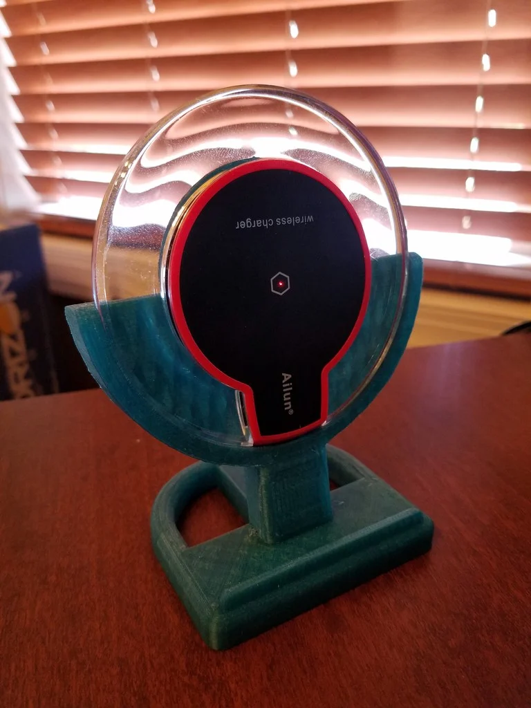 Wireless charger stand using inexpensive Ailun pad.
