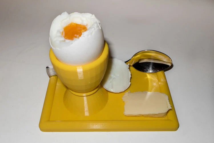 Egg cup with plate and spoonholder