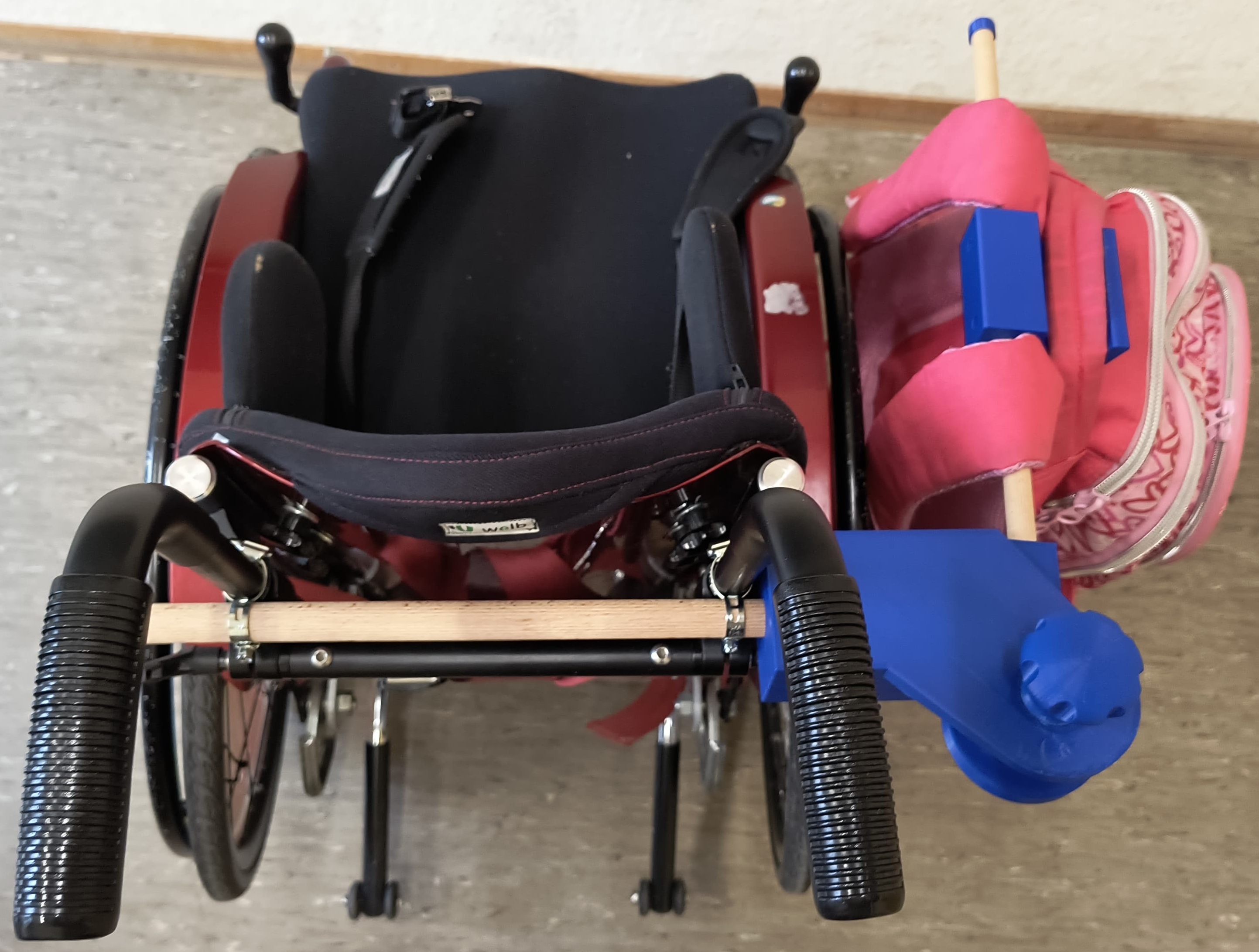 Assistive backpack mount for wheelchair users