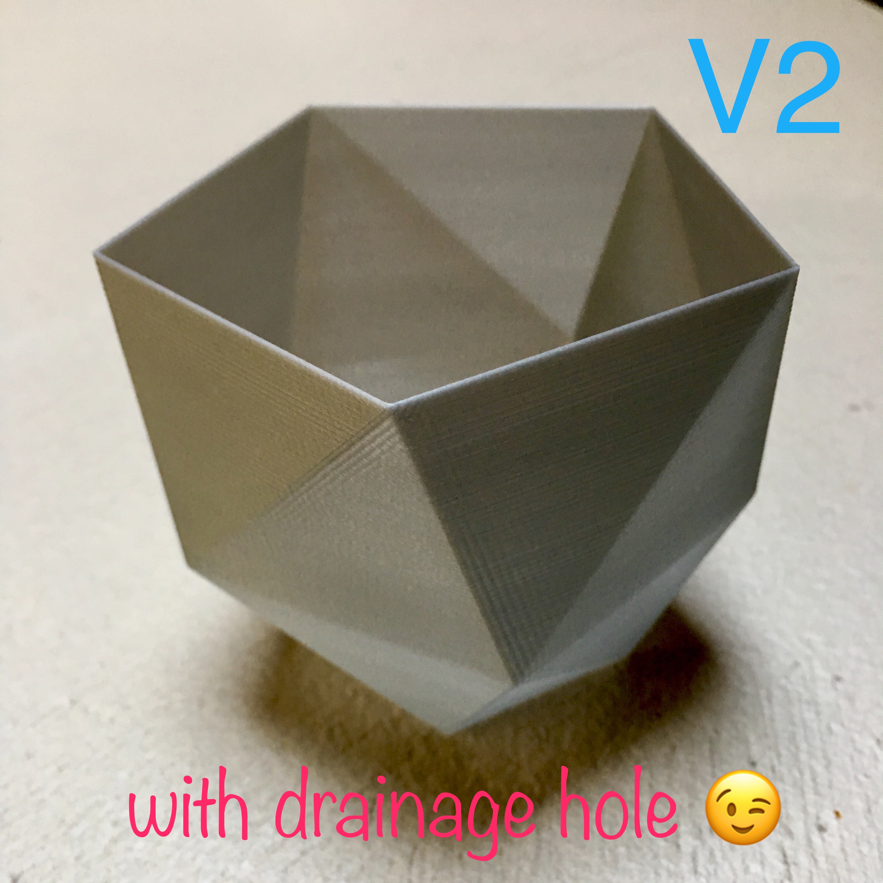 Twisted polygonal 5 faces vase with draining hole