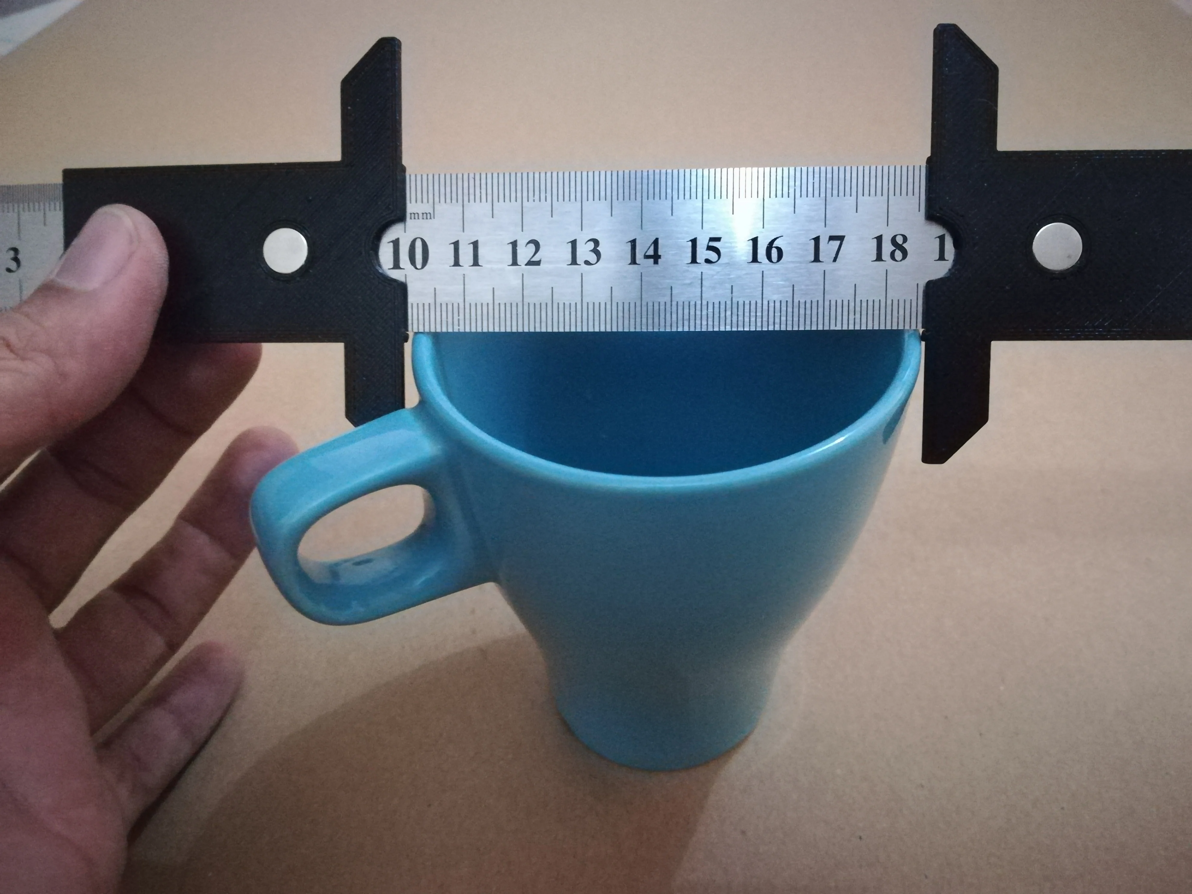 Caliper for steel rule