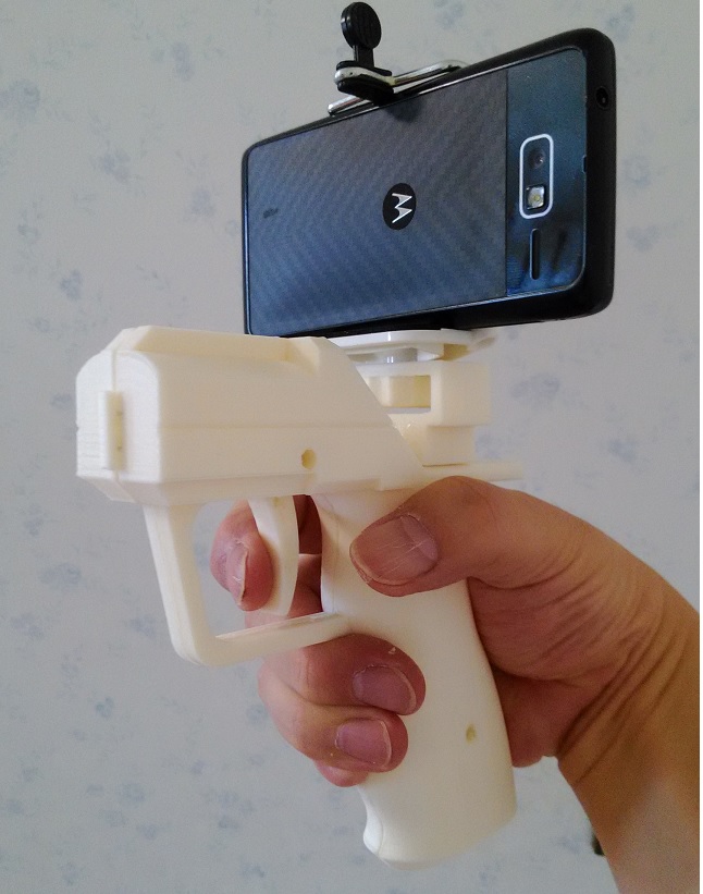 Gun-type camera holder