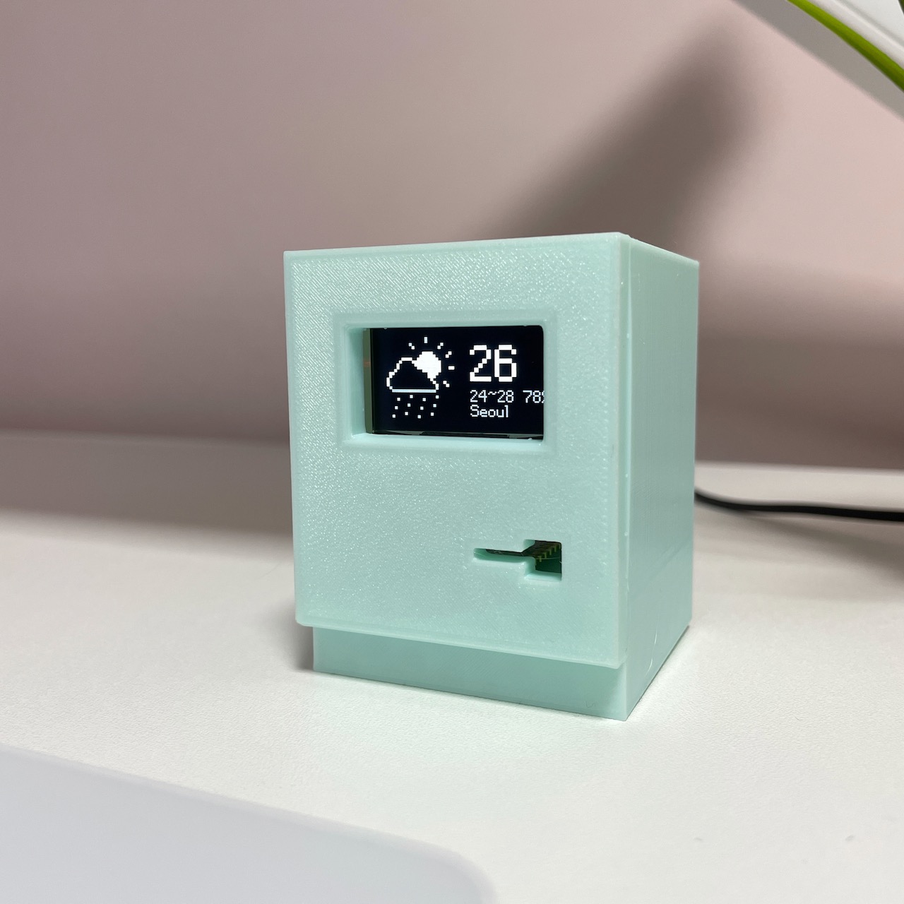 A classic Macintosh-style weather station