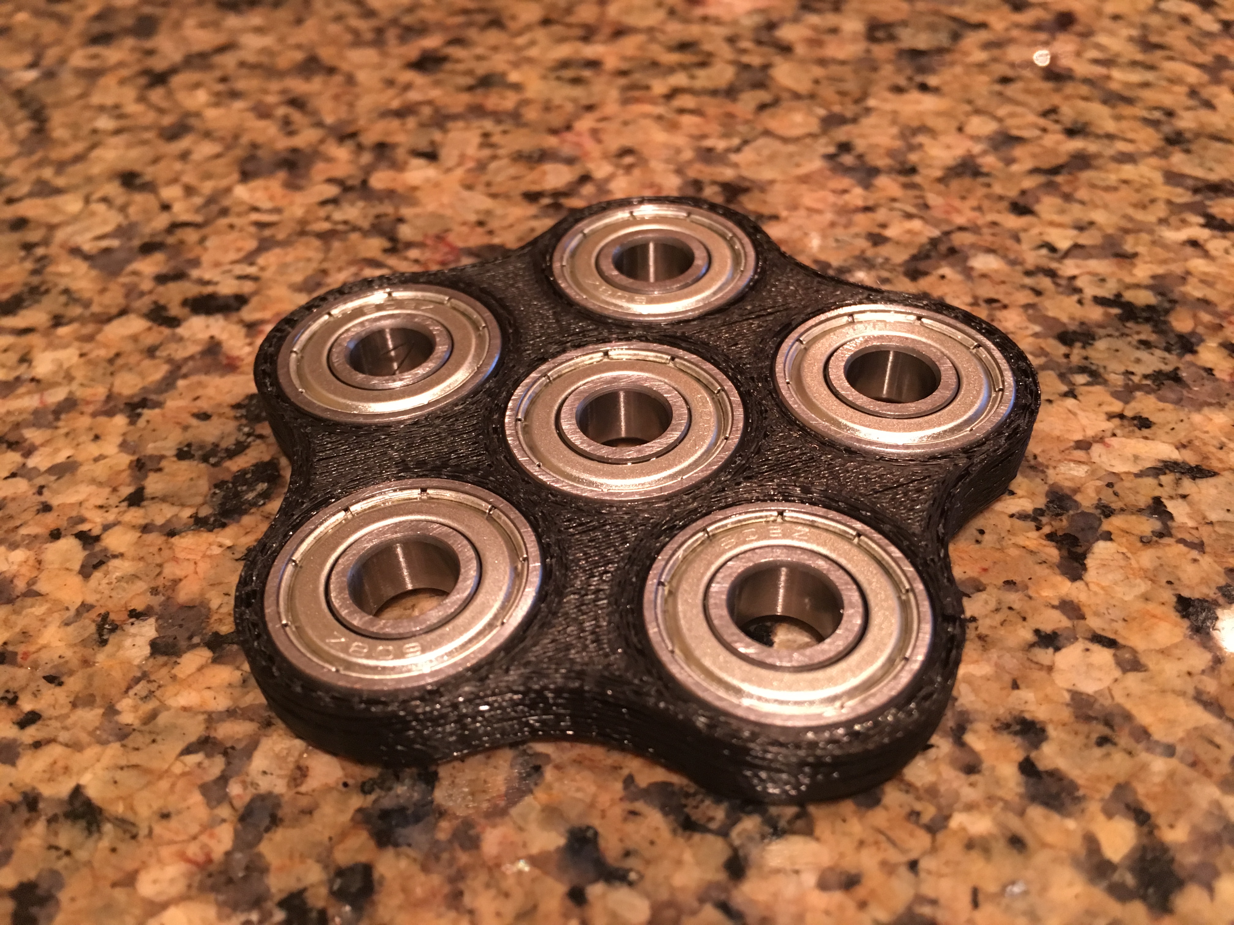 Cinco hand spinner fidget