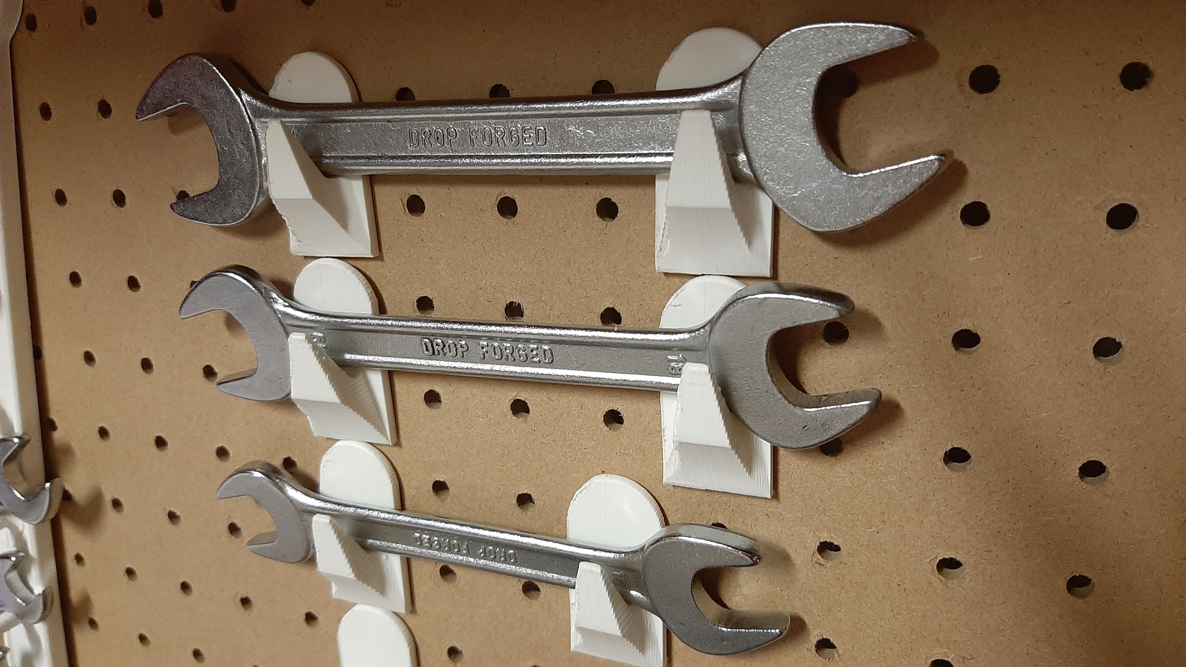 Gancio per attrezzi. Hook for tools, Wrench hook