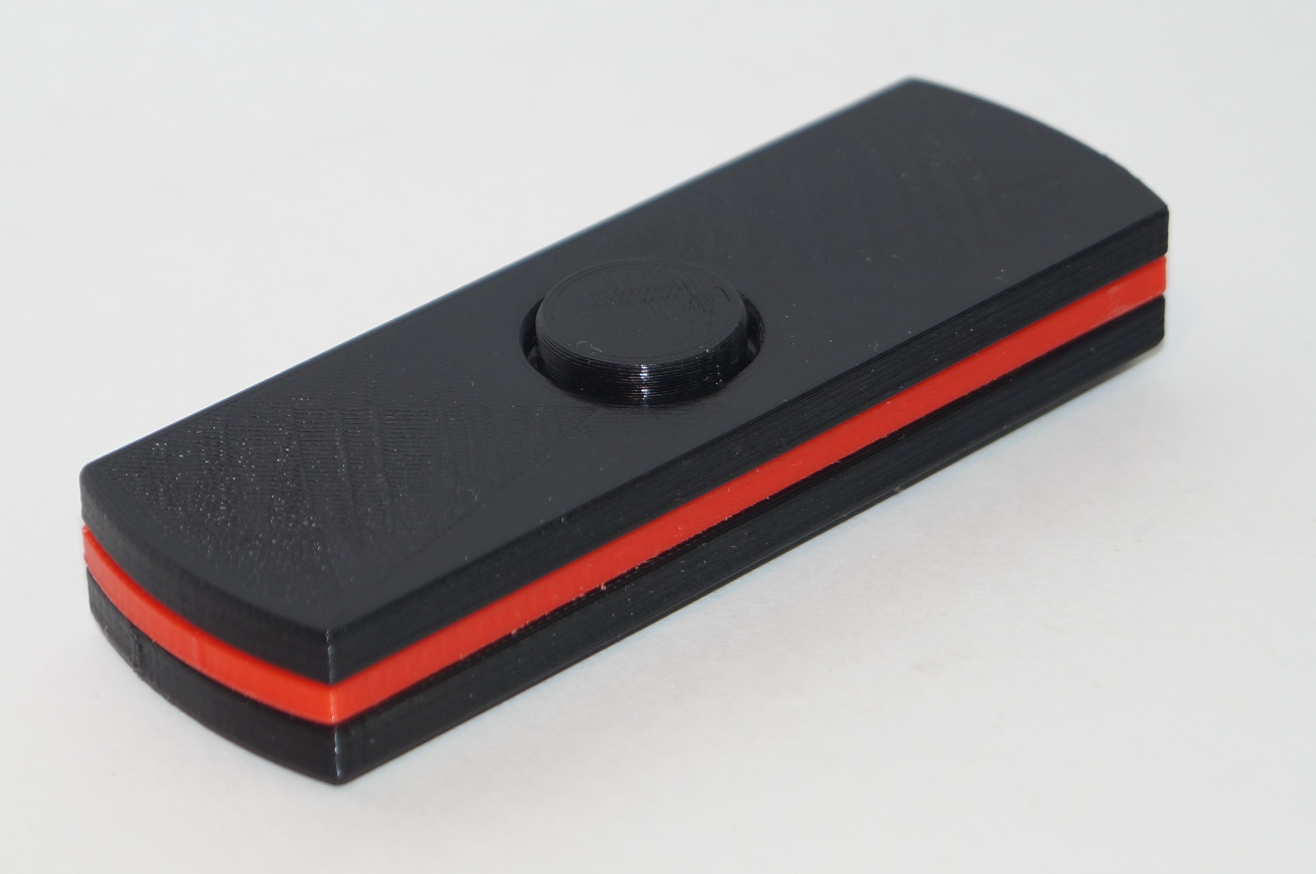 Spinner black with a red line