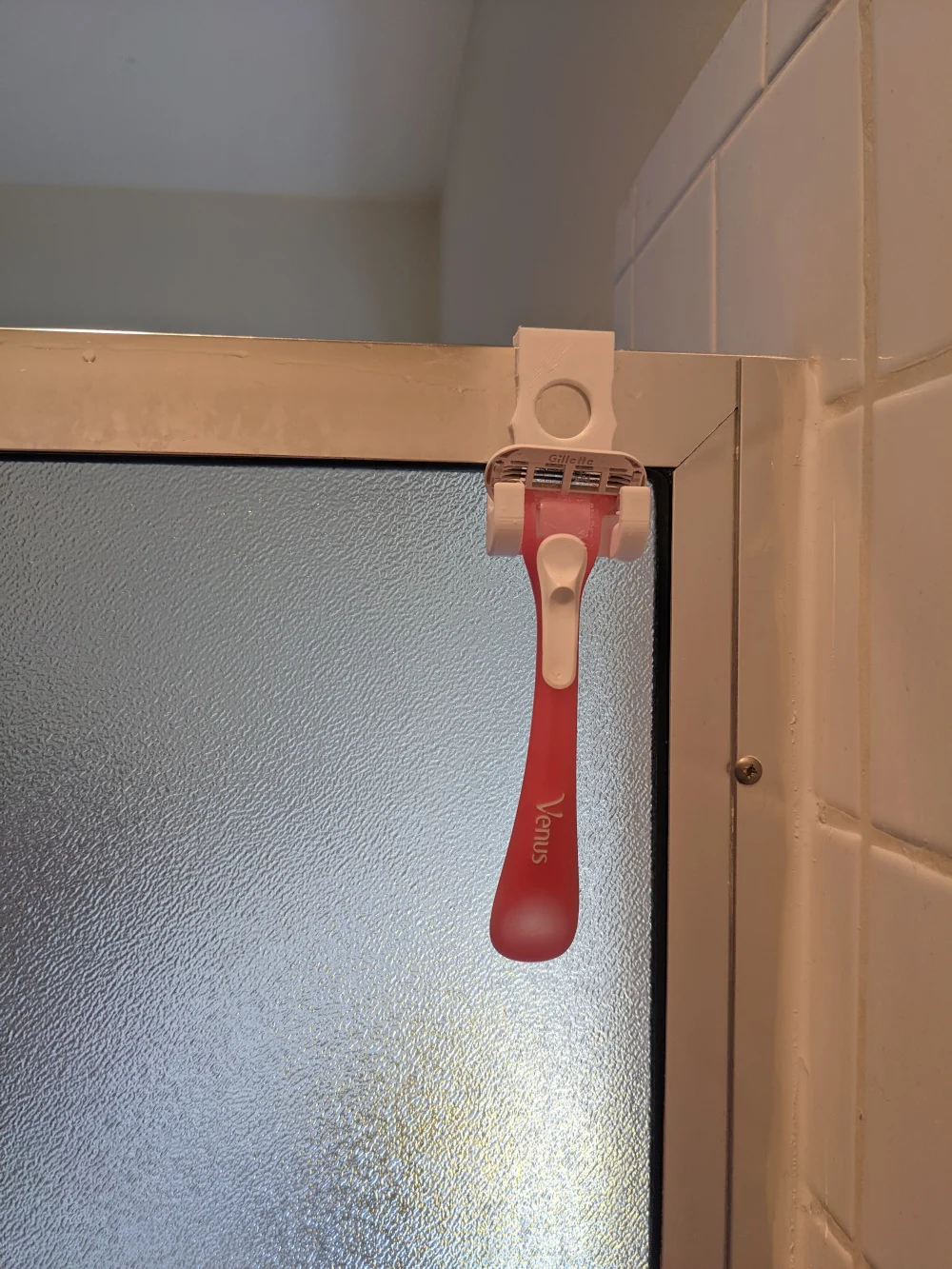 Gilette razor shower hook for aluminum channel