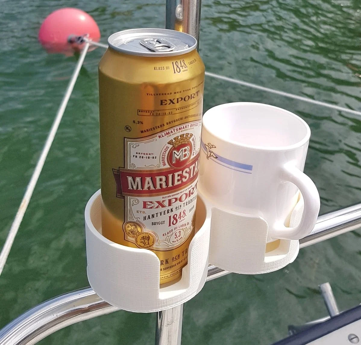 Rail mounted cup/can holder for boats