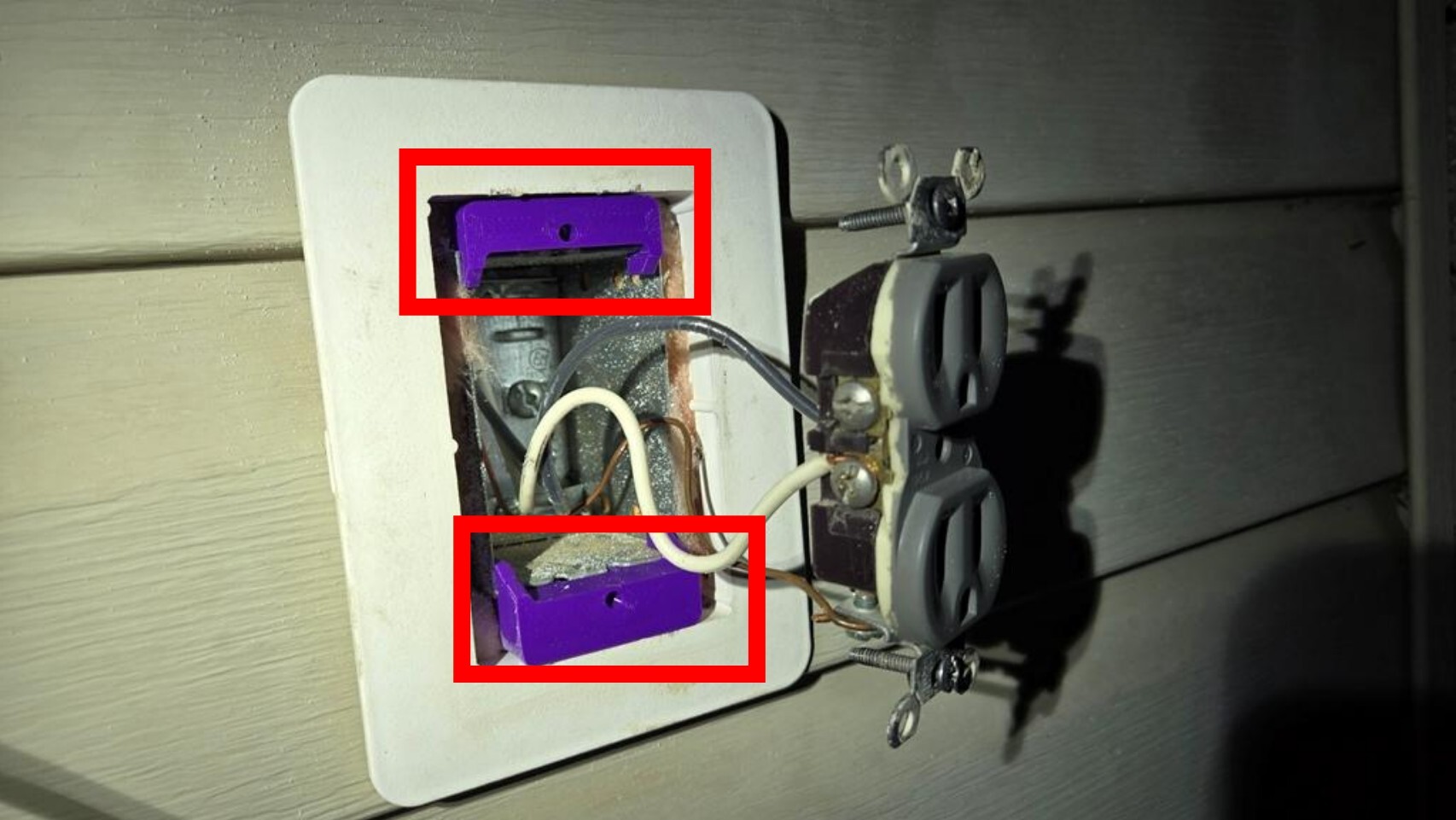 Spacer for power outlet face plate (North America)