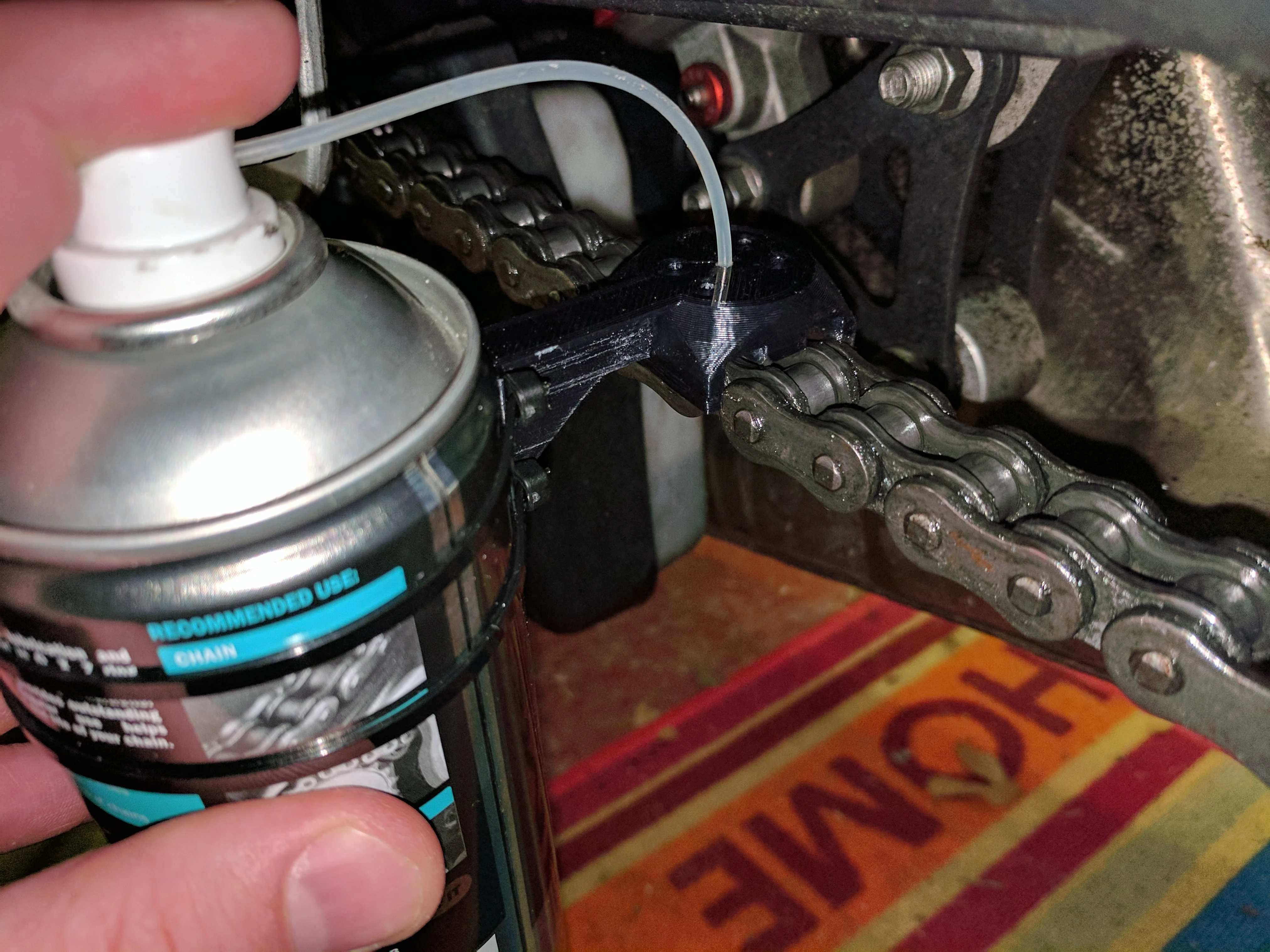 Motorcycle chain oiler