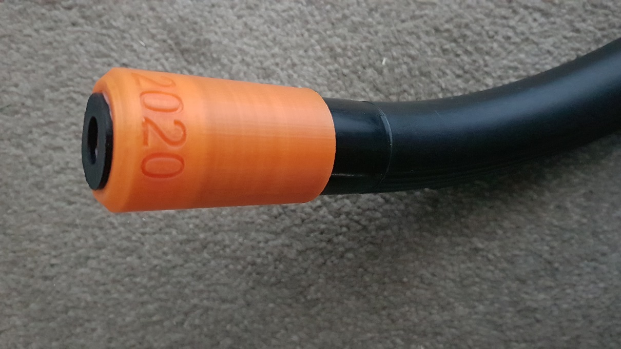 Vacuum cleaner adapter for re-usable filament vacuum bags