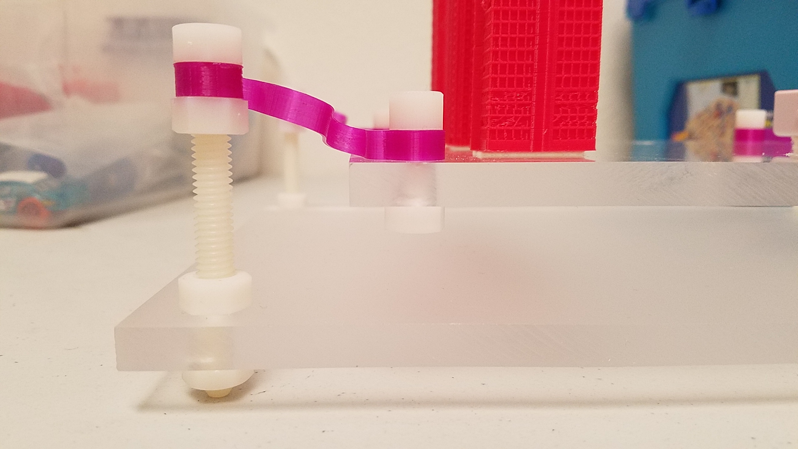 Earthquake shake table spring