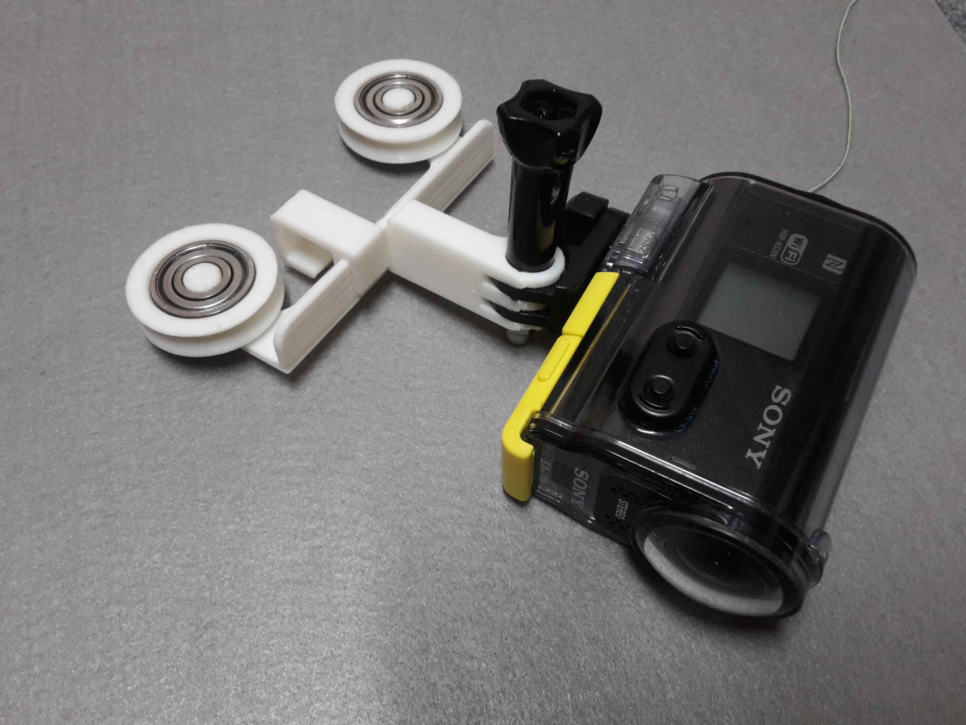 Action cable cam