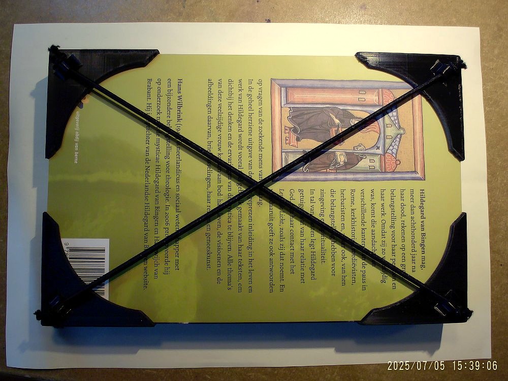 Paperback book corner protectors for travelling (remix with higher sides).