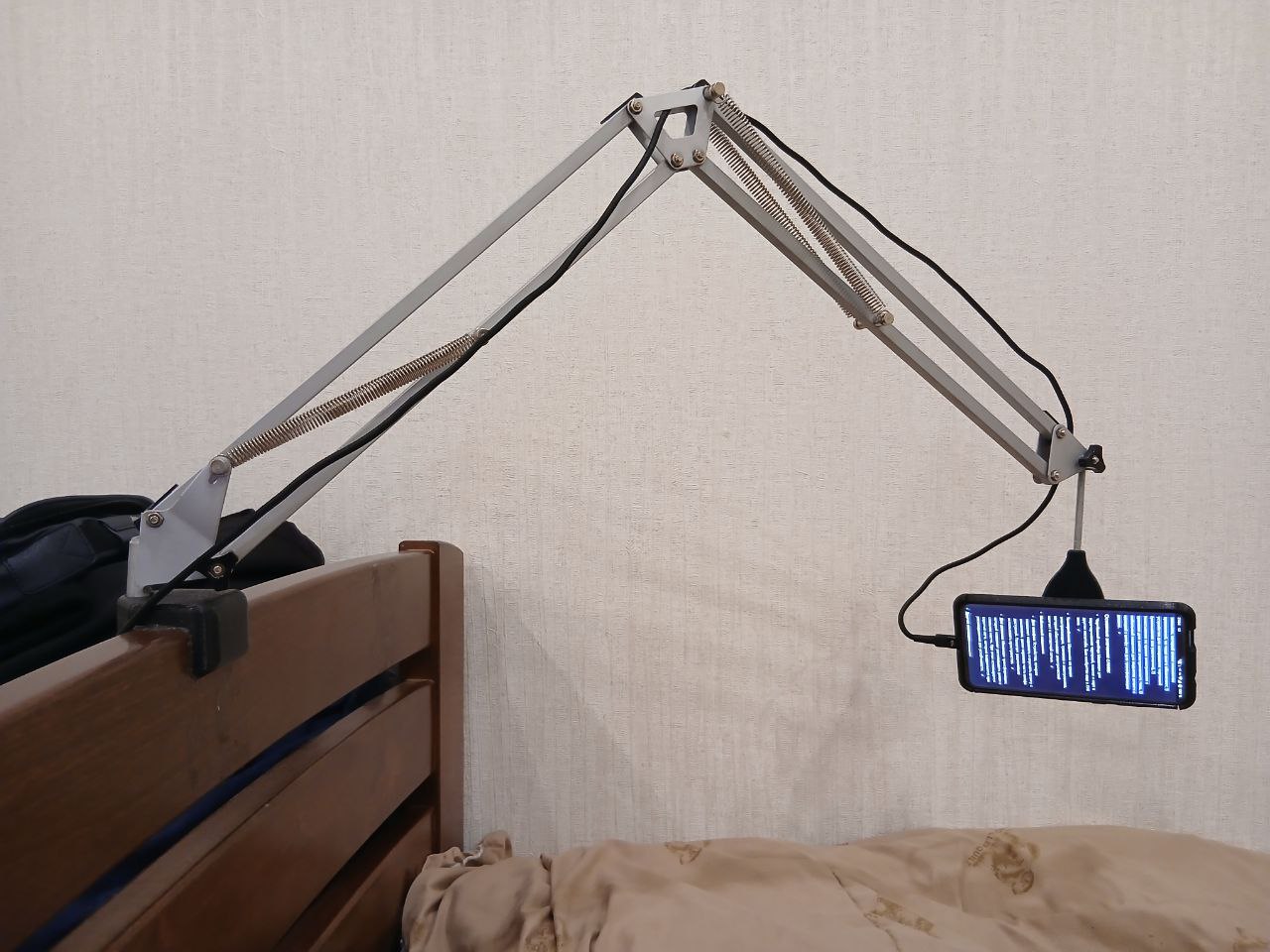Boom arm phone holder