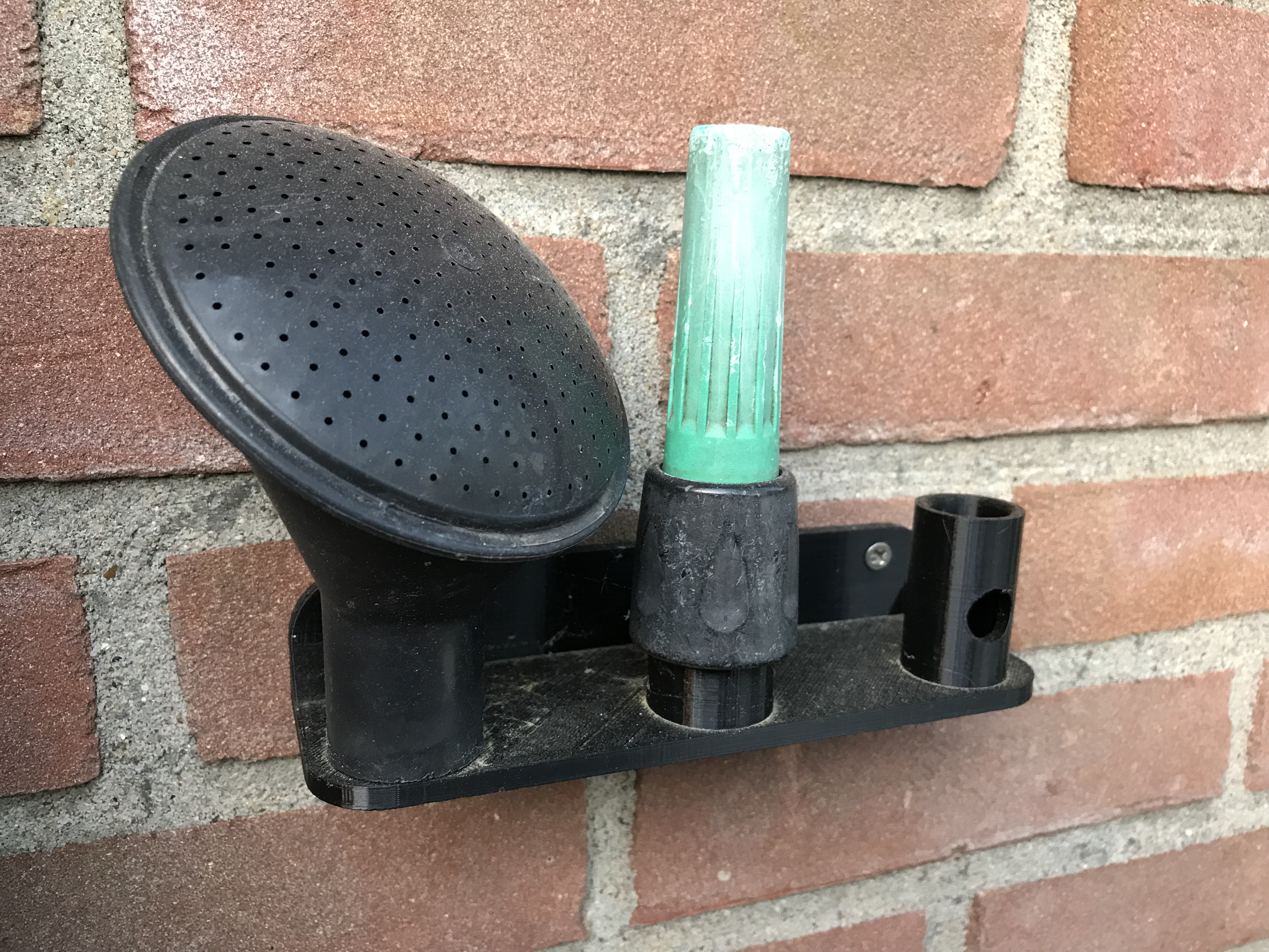 Wateringcan top holder