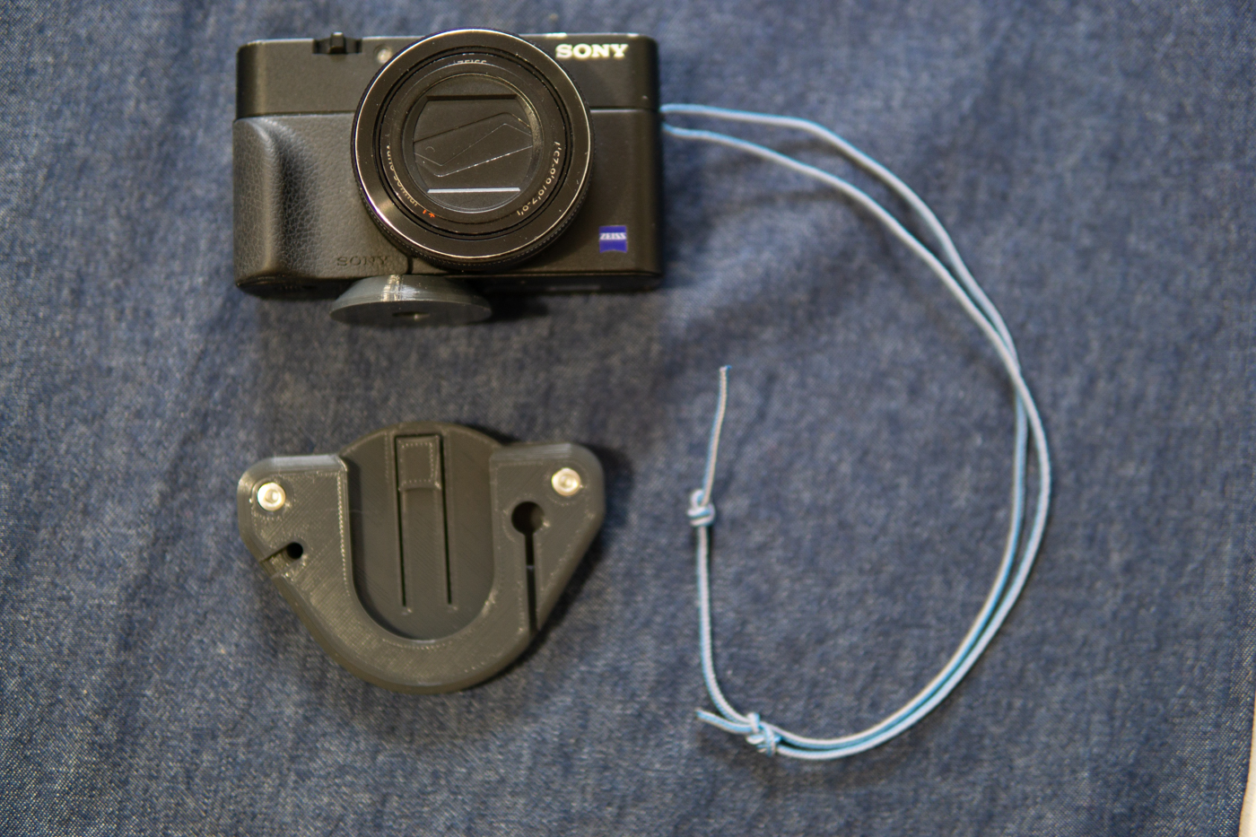 Camera backpack shoulder strap mount