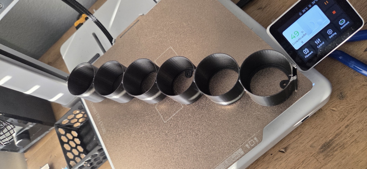 Modular caulk tube holder