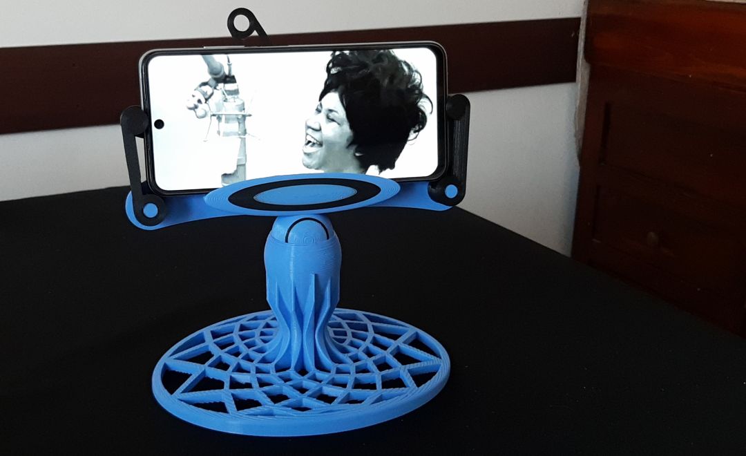 Universal phone support with automatic clamp, Phone stand. Supporto telefono universale con meccanismo automatico di aggancio