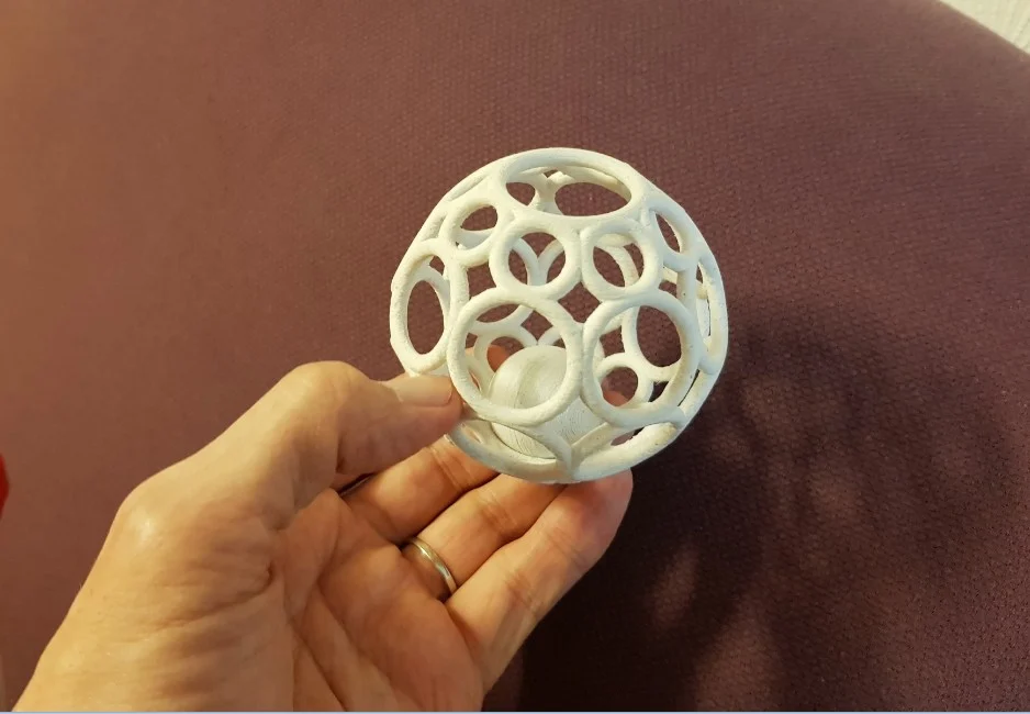 Spherical cage with ball