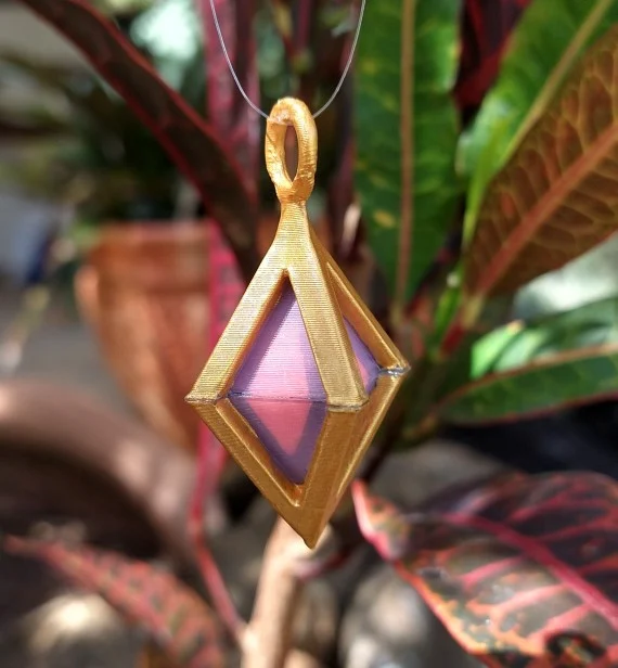 Reyna's Gunbuddy pendant