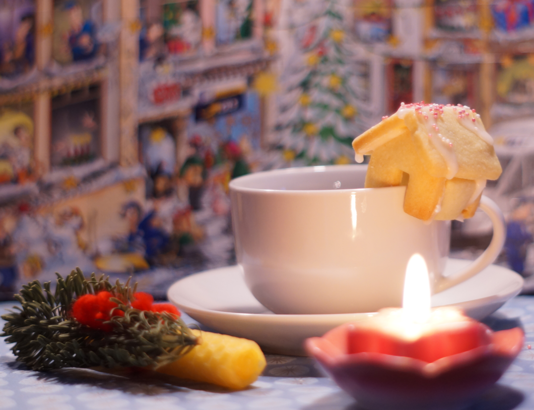 Christmas House that sits on the edge of your mug.