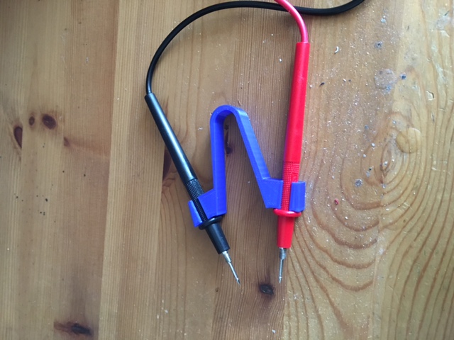multimeter probe hand