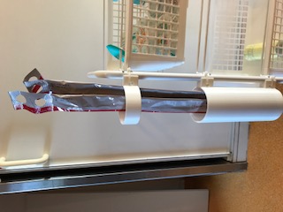 [K] Porte-sonde (Urinary catheter compartment)