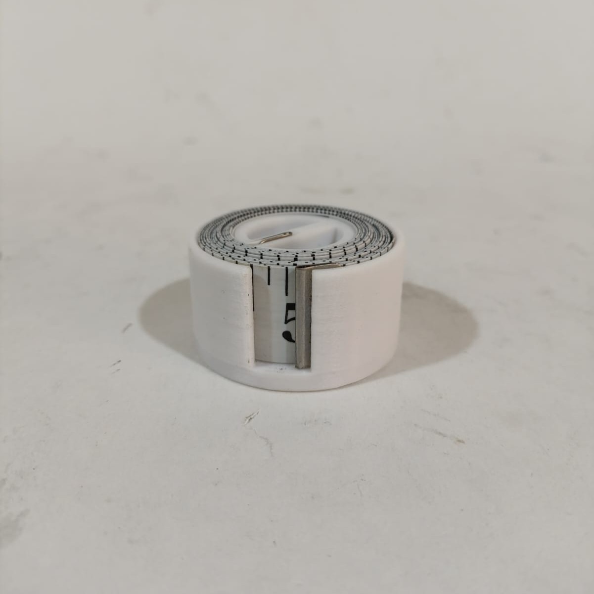 Measure Tape Dispenser (Dispensador cinta metrica)