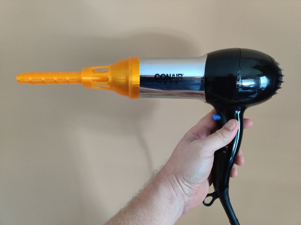 Blow dryer attachment for closed-end masturbators and sex dolls