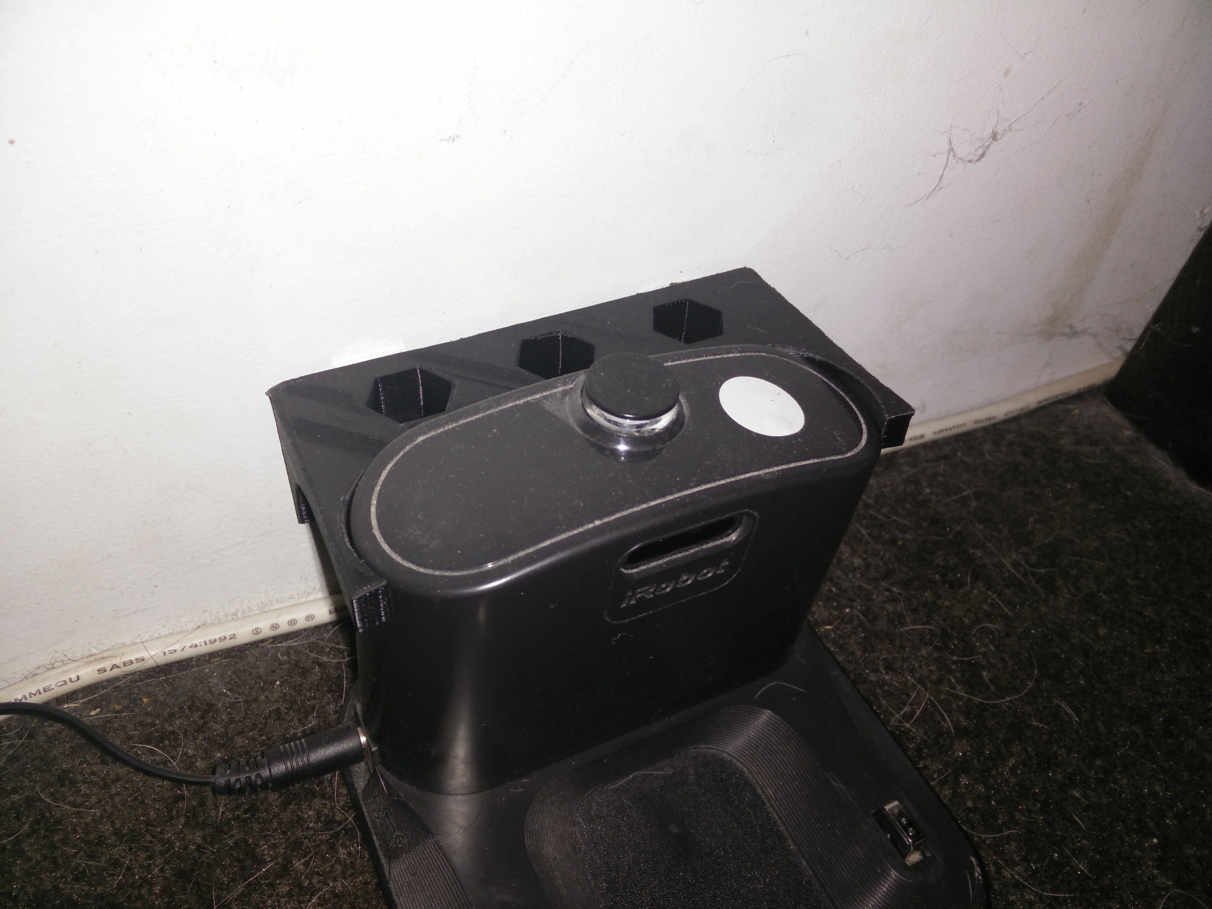 Roomba charger wall clip