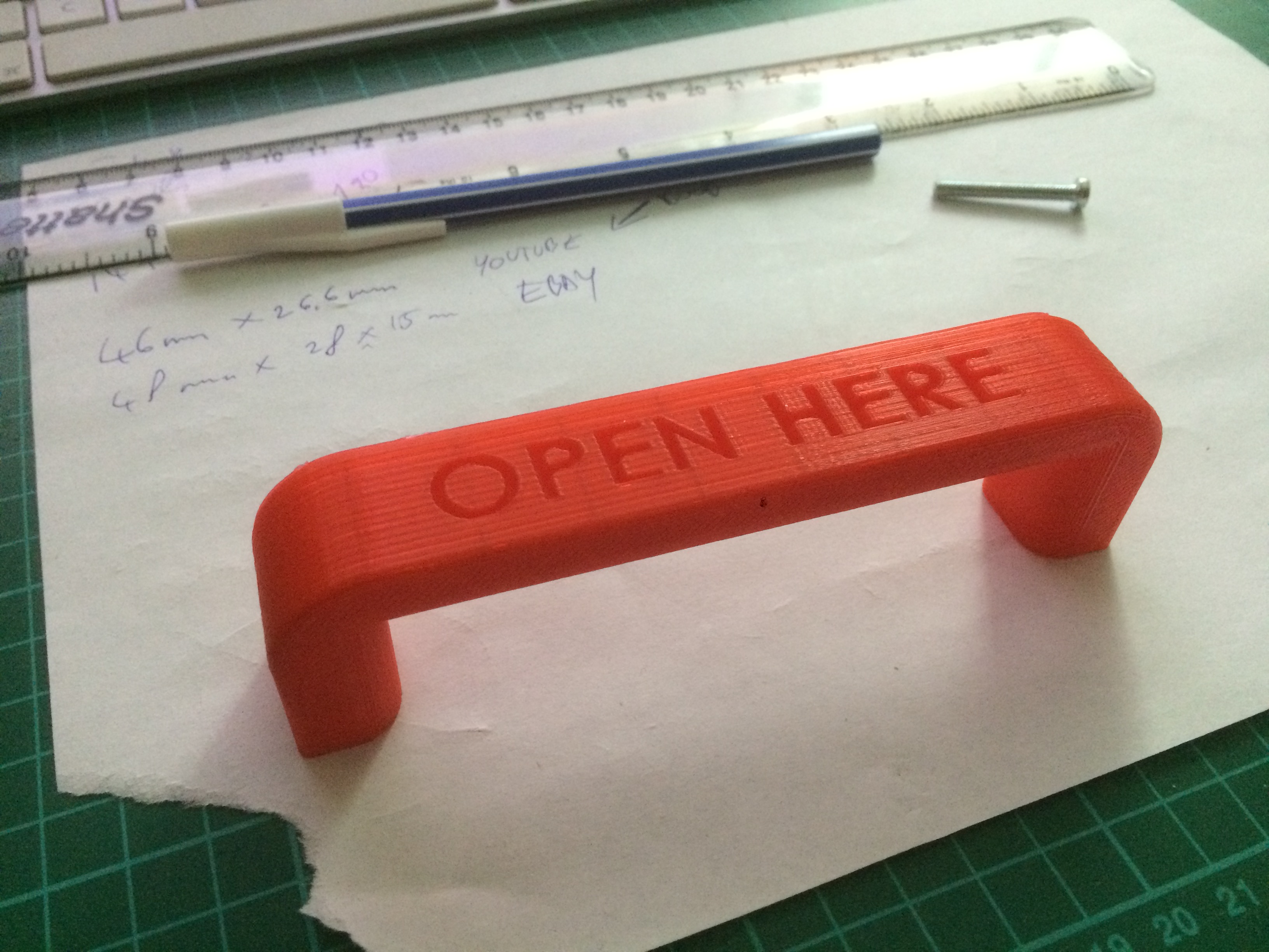 OPEN HERE handle