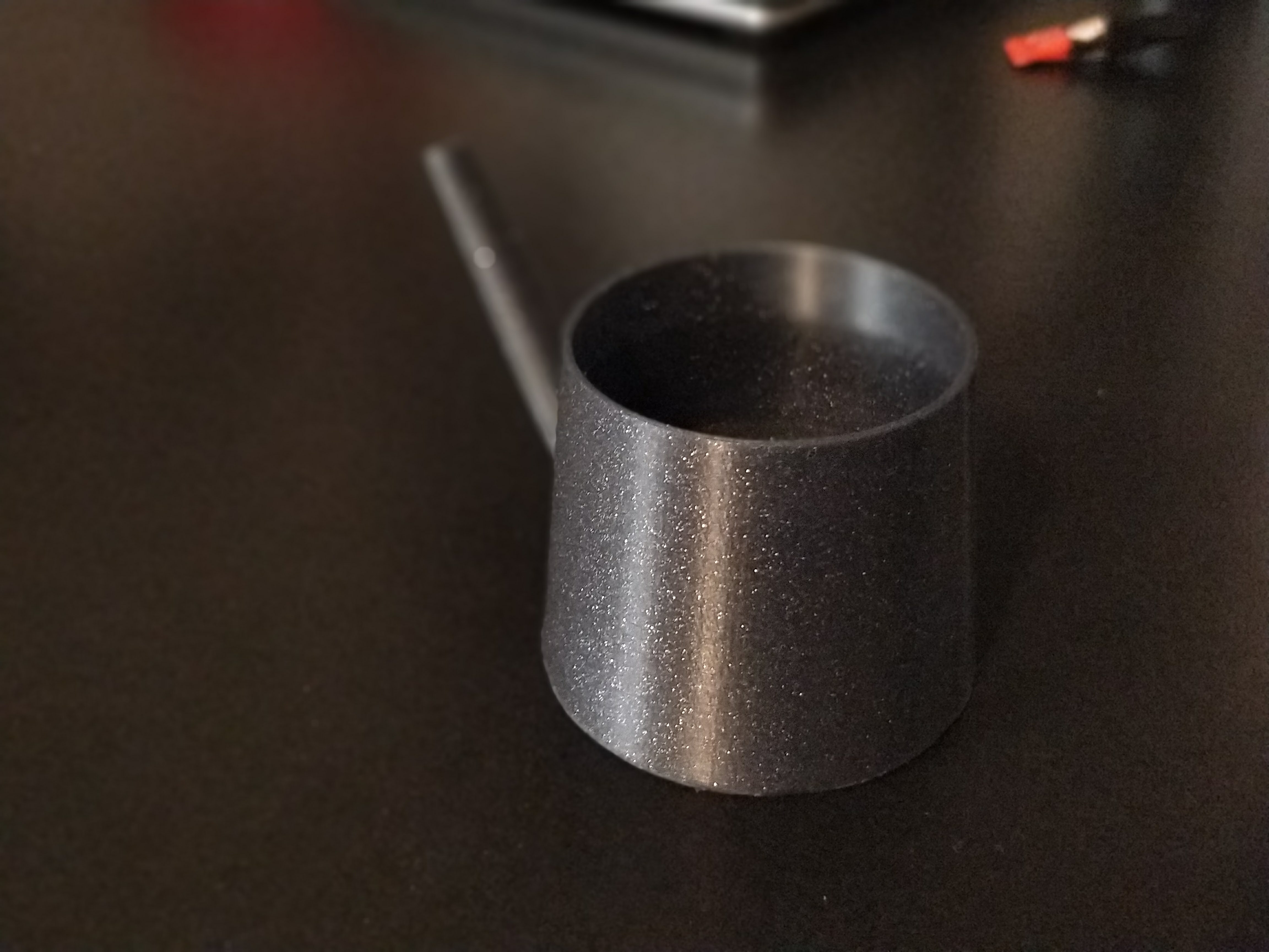 Tiny watering can