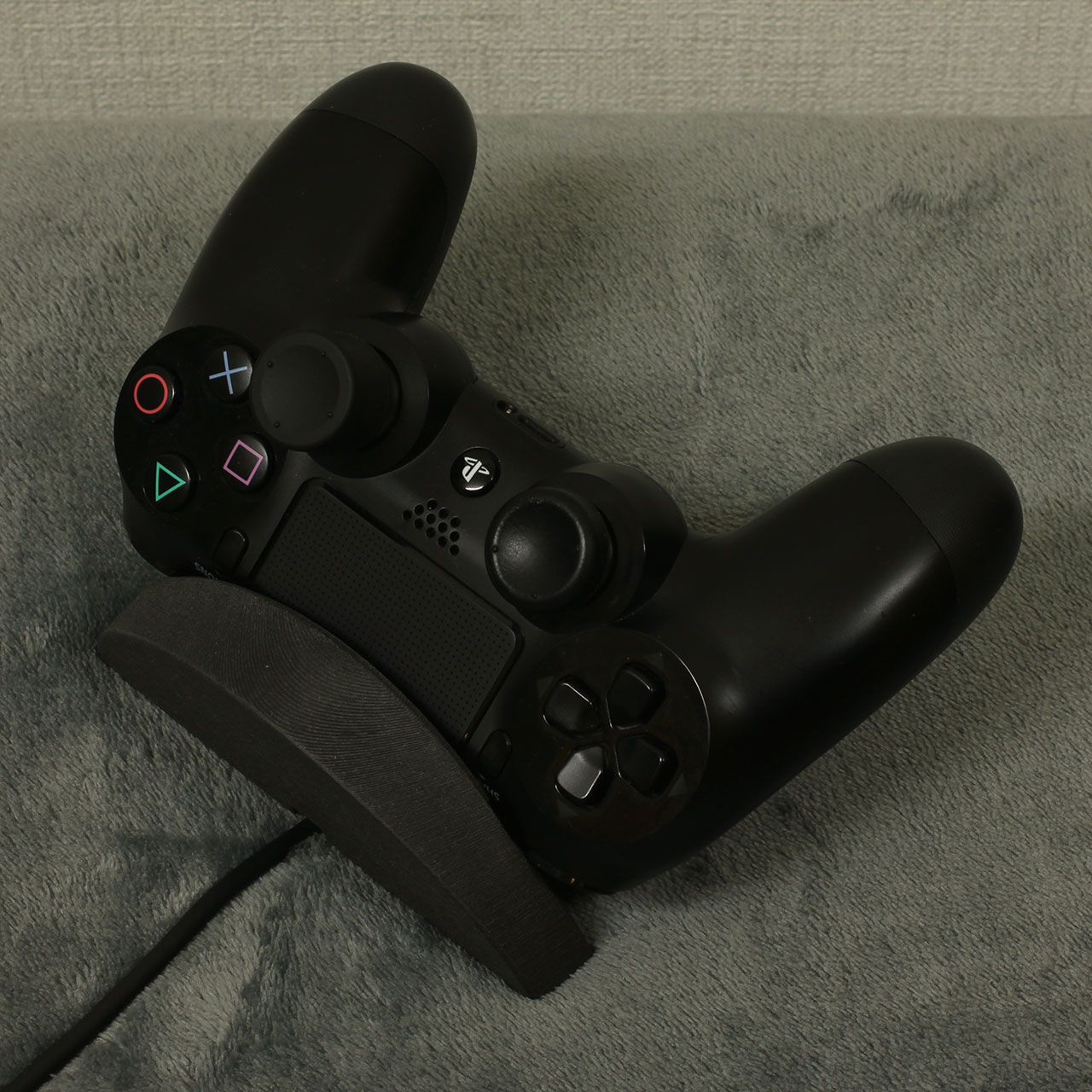 PlayStation 4 gamepad stand with charger
