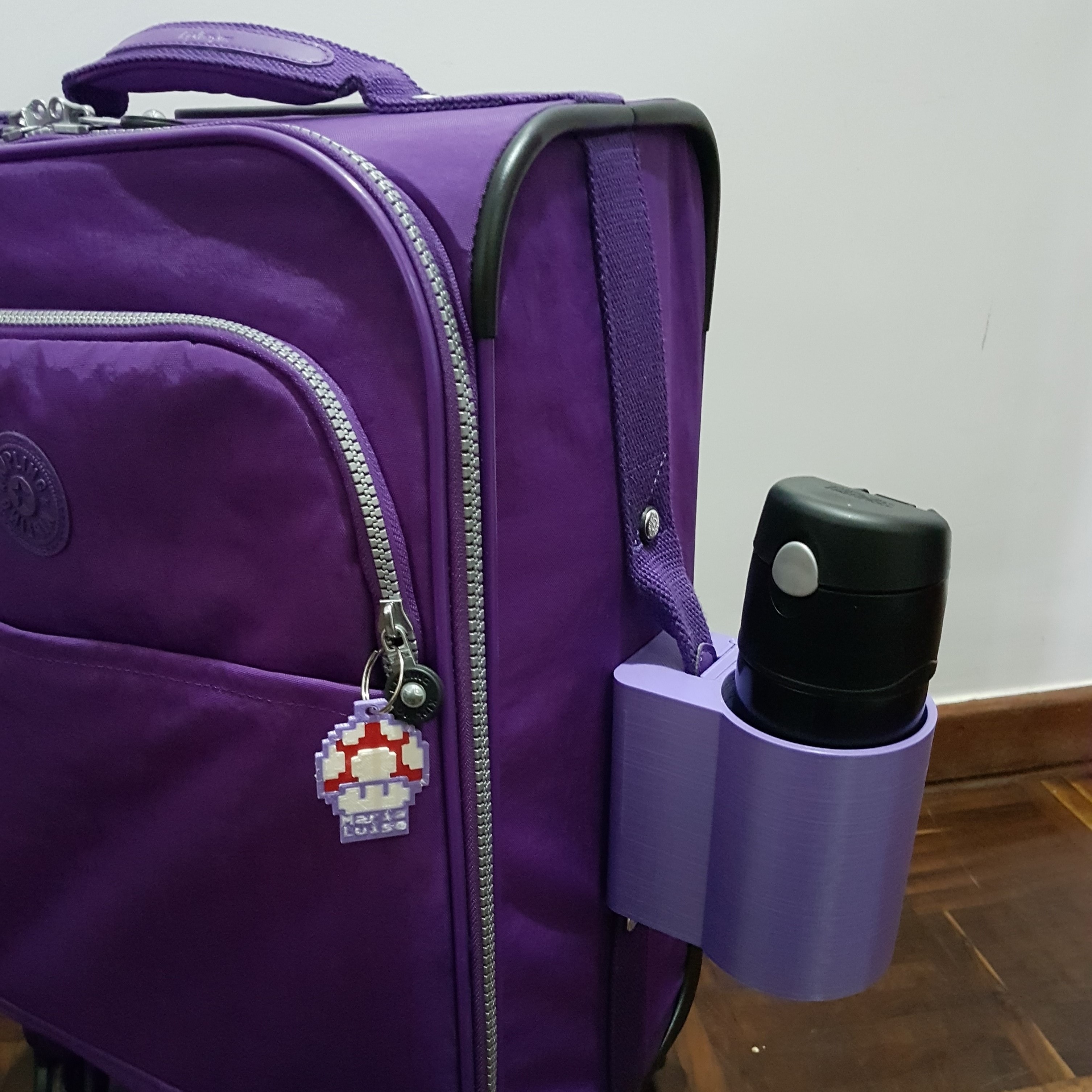 Cup holder for carry-on luggage