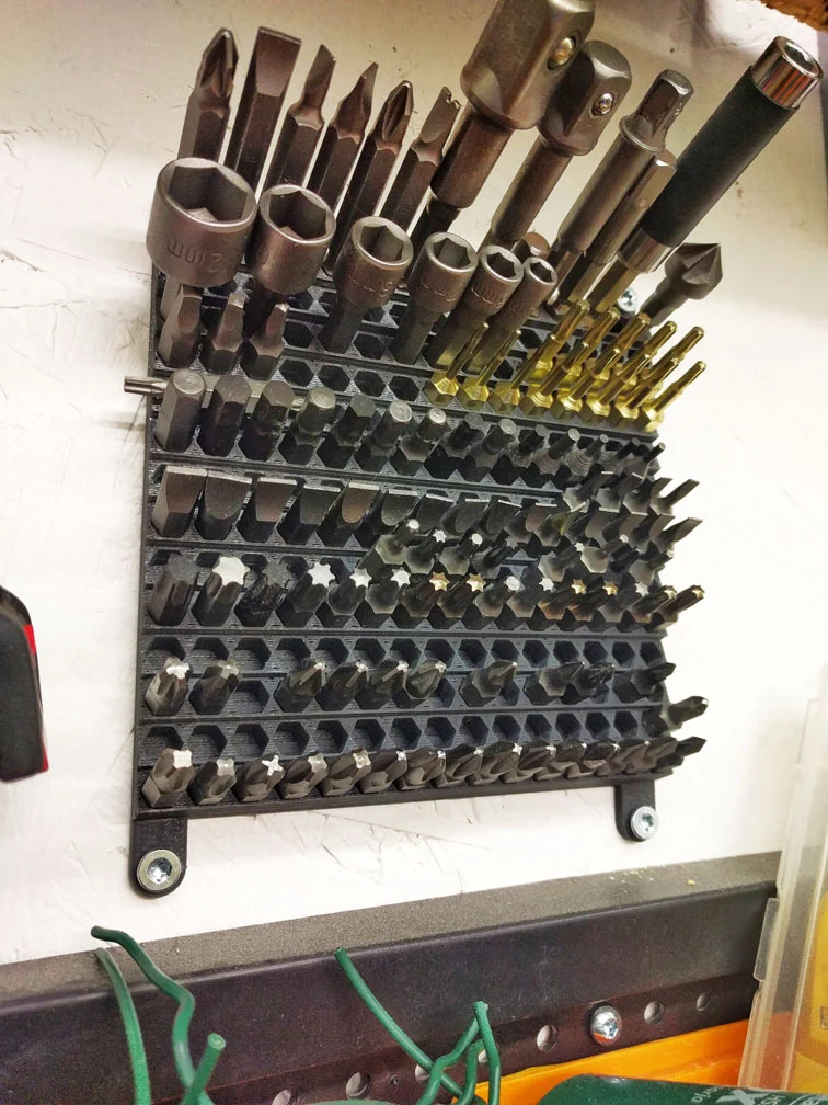 Wall mounted hex bits holder