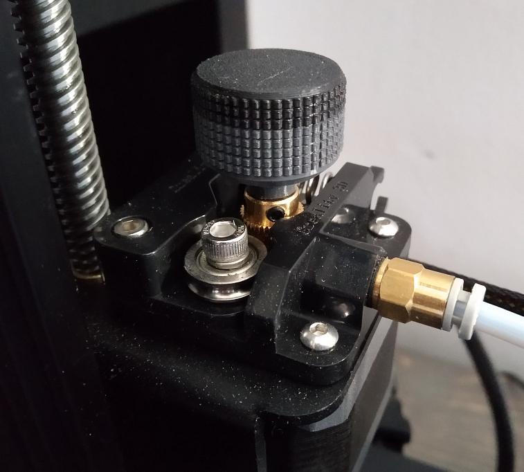 Yet Another Extruder Knob for the Creality Ender 3 / Ender 3 Pro / Cr-10 (and other printers with extruders with a flatted 5 mm axis)