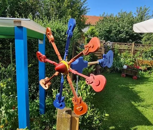 Wind chime guitar style rotatable
