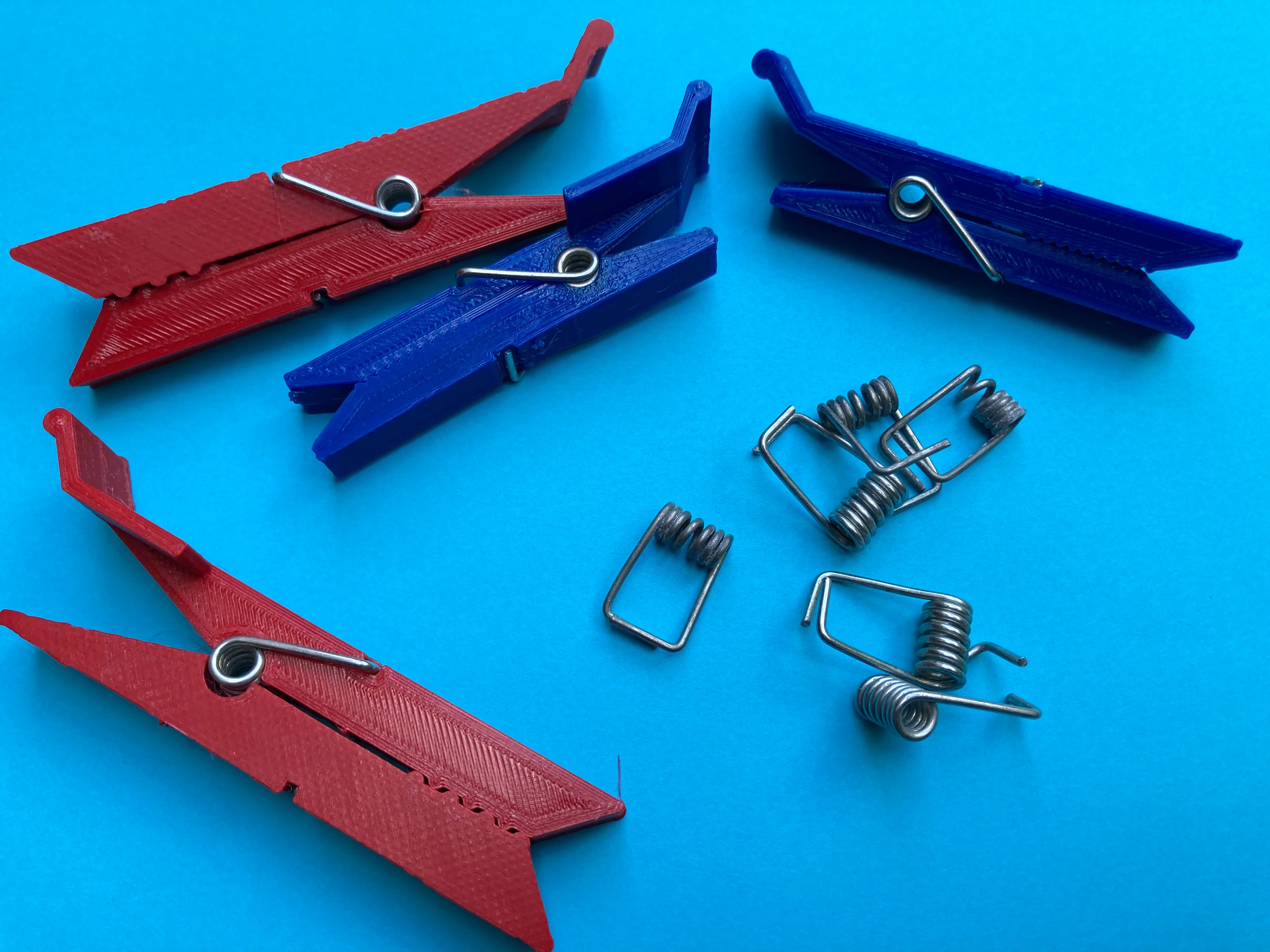 Clothespin for piping rail