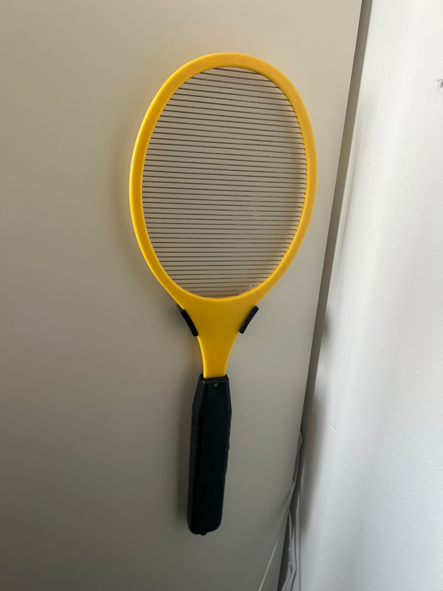 Electric fly swatter holder