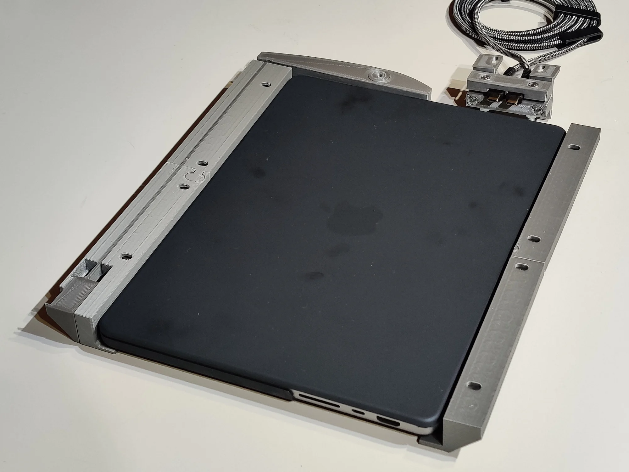 Laptop under desk dock