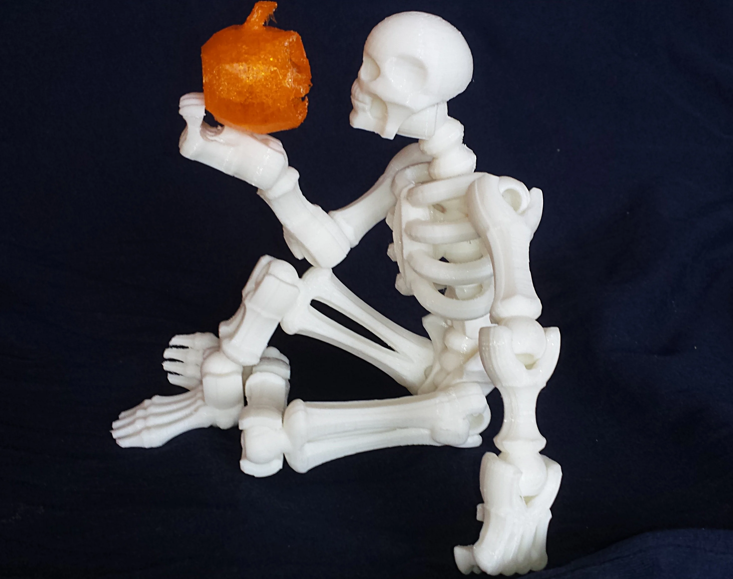 Printable Skeleton with a Little Pumpkin