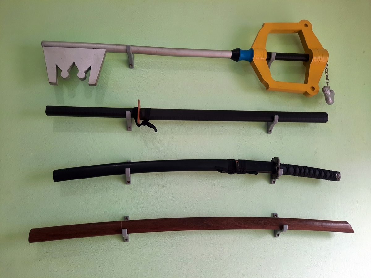 Wall Support for Umbrella or Swords