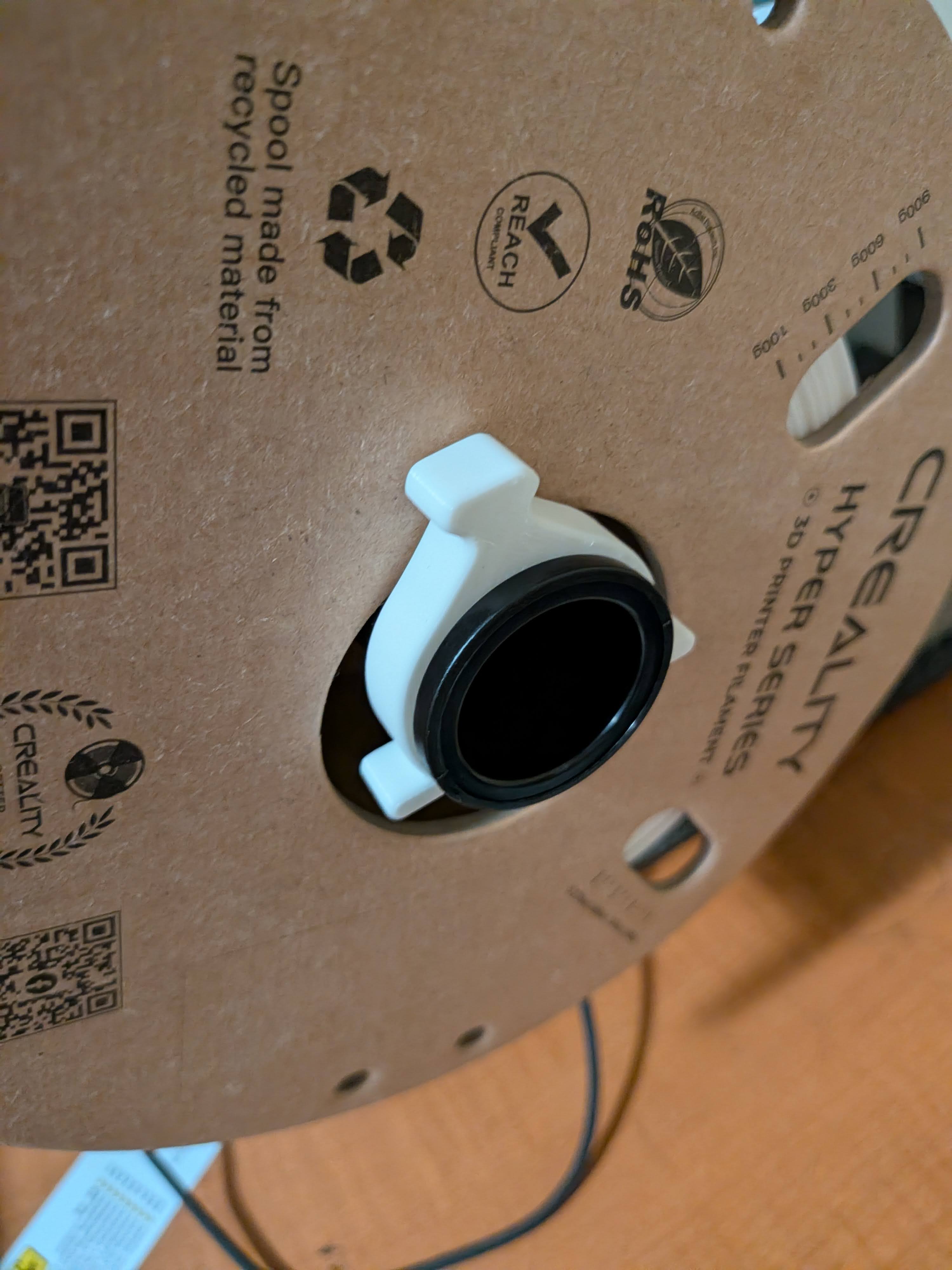 Spool spacer for filament holder