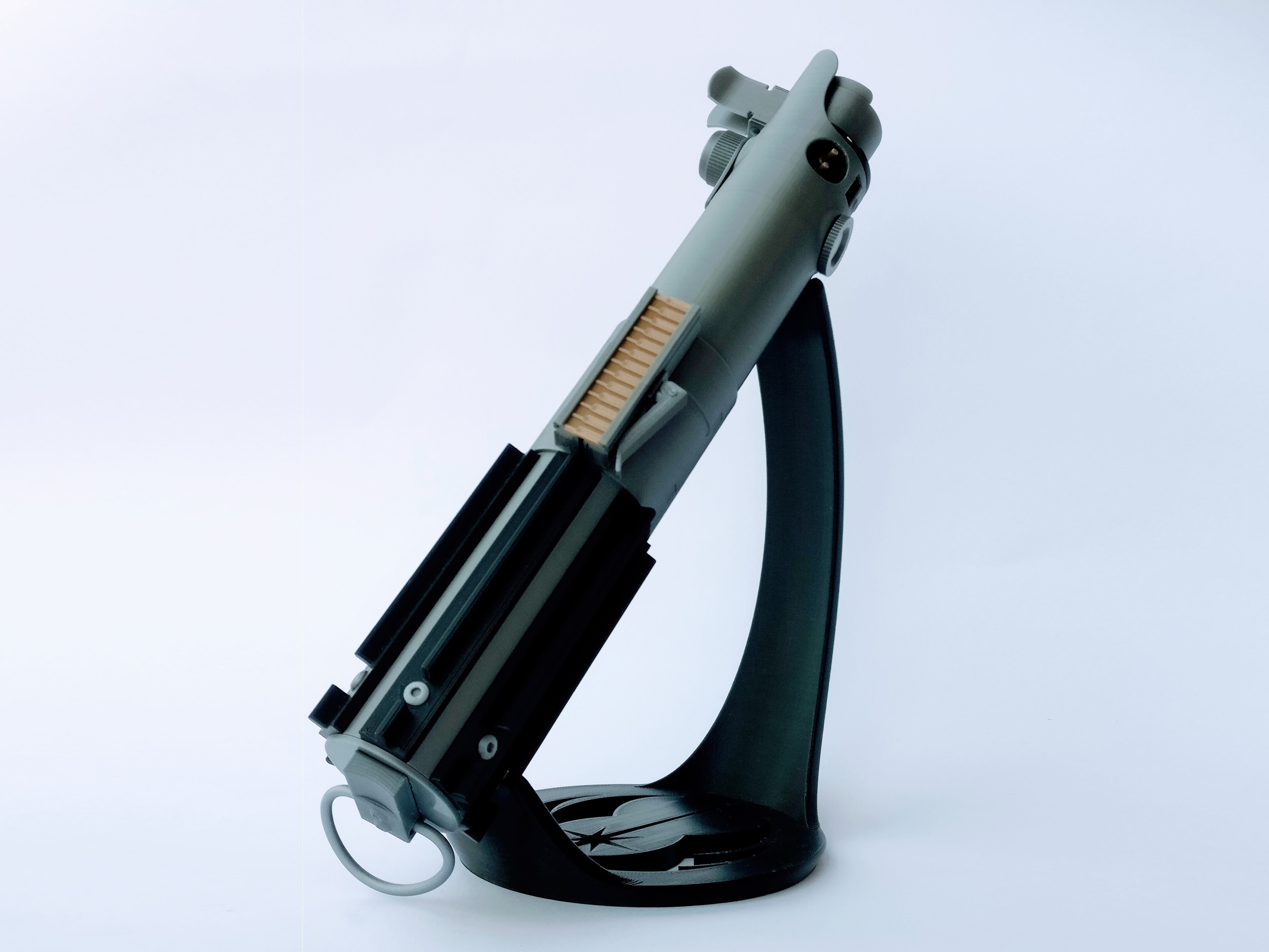 Tilted display stand for lightsaber hilt