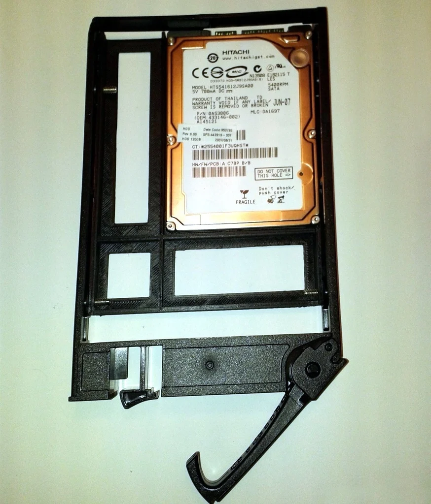 Modified 2.5" to 3.5" adapter tray for Microserver caddy